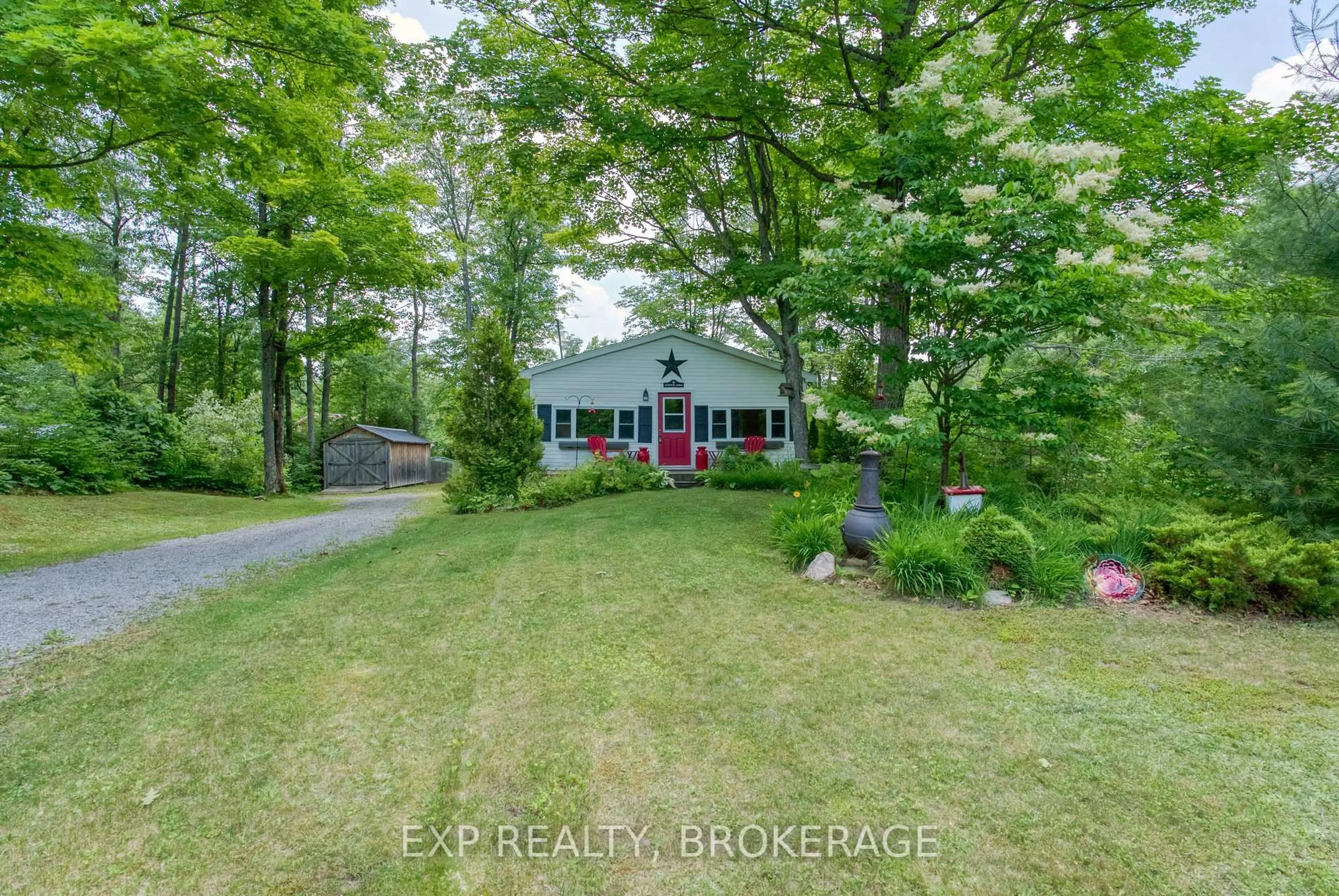 A pic from outside/outdoor area/front of a property/back of a property/a pic from drone, street for 1036 Lakeshore Rd, Arden Ontario K0H 1B0