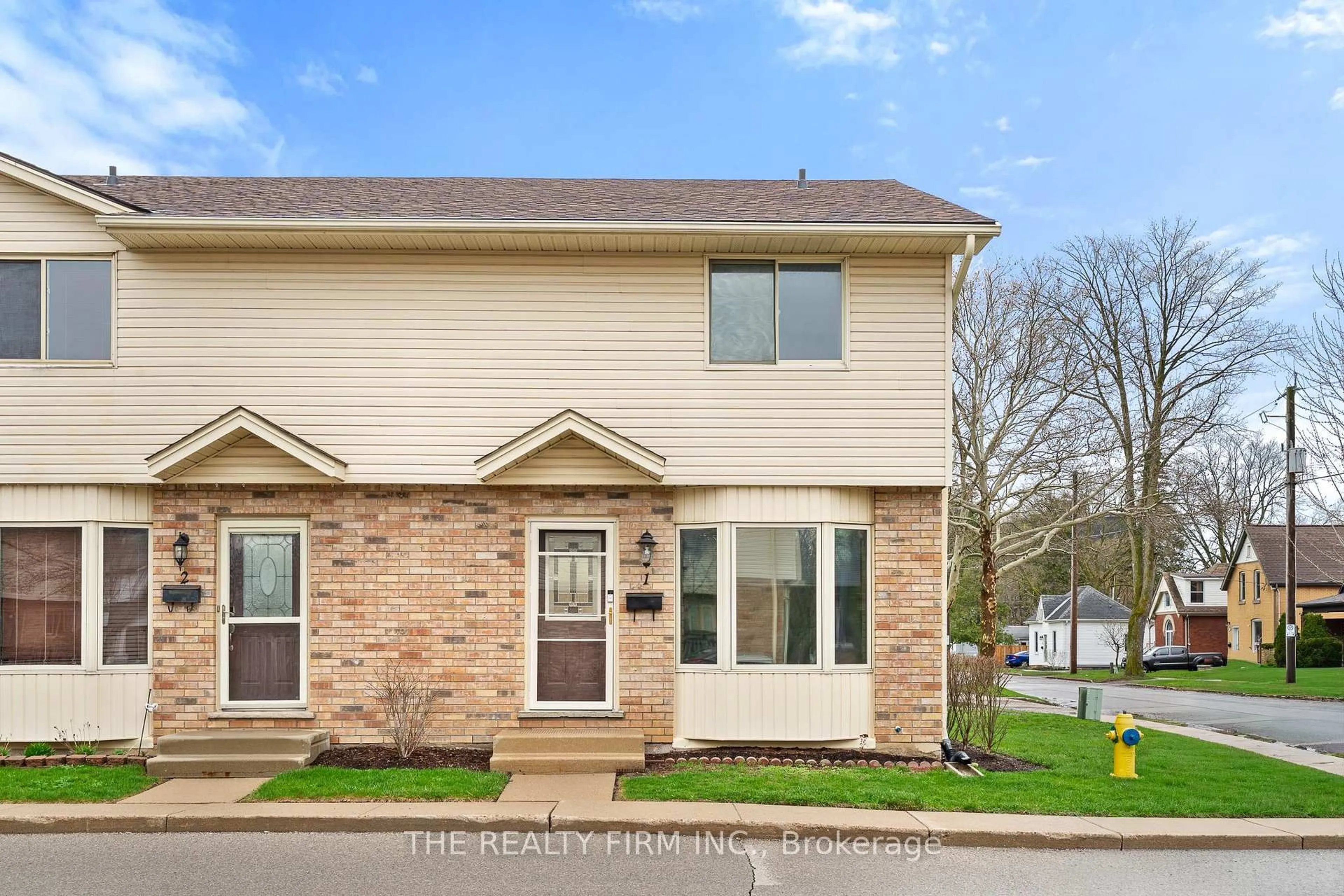 Home with vinyl exterior material, street for 40 Burslem St #1, London East Ontario N5W 2V7