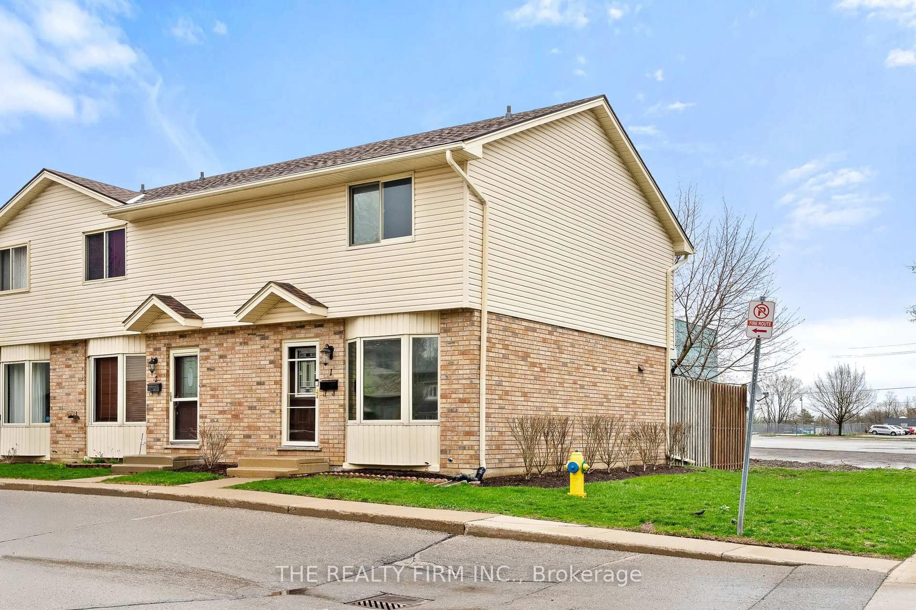 Home with brick exterior material, street for 40 Burslem St #1, London East Ontario N5W 2V7