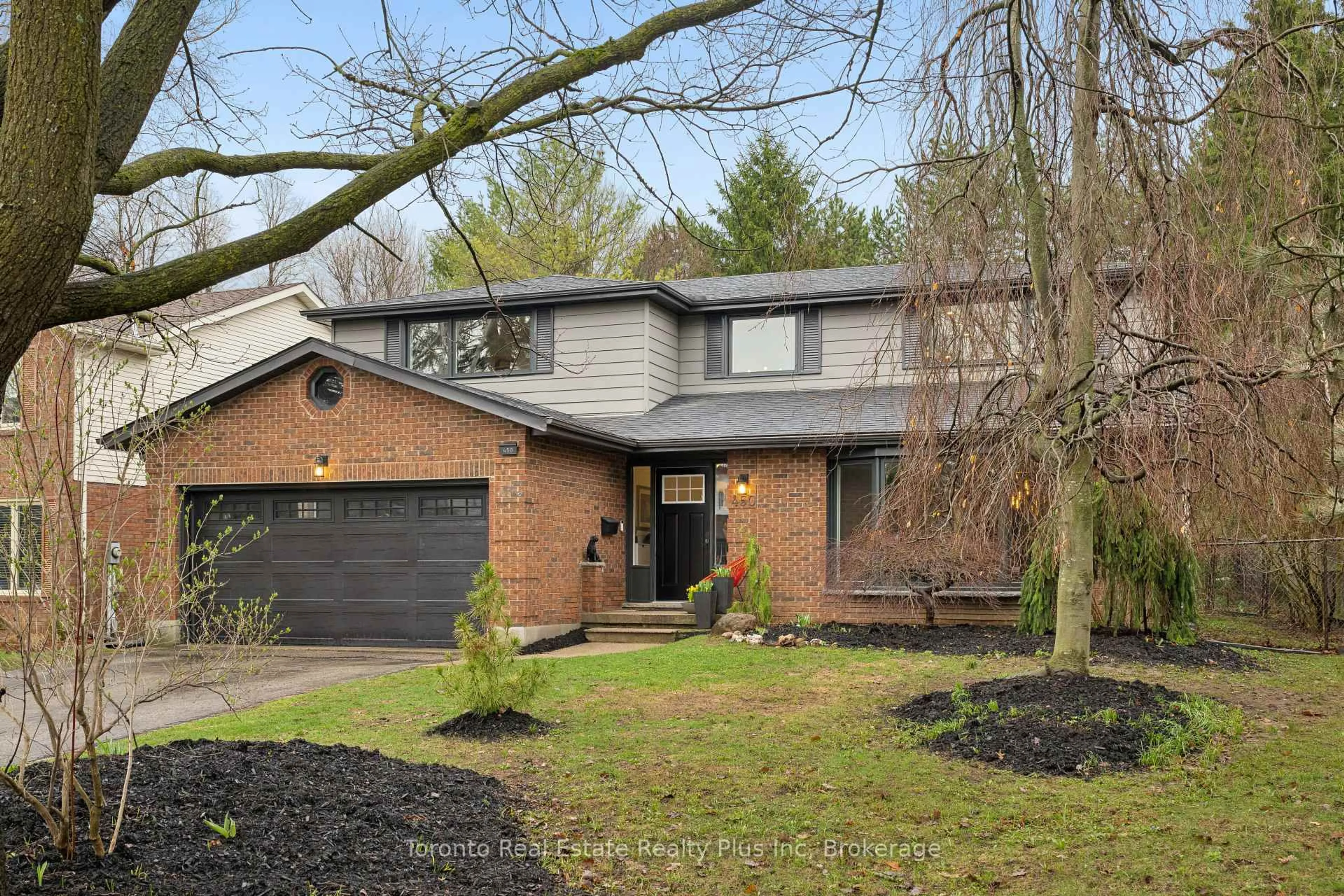 Home with brick exterior material, street for 450 Winchester Dr, Waterloo Ontario N2T 1J1