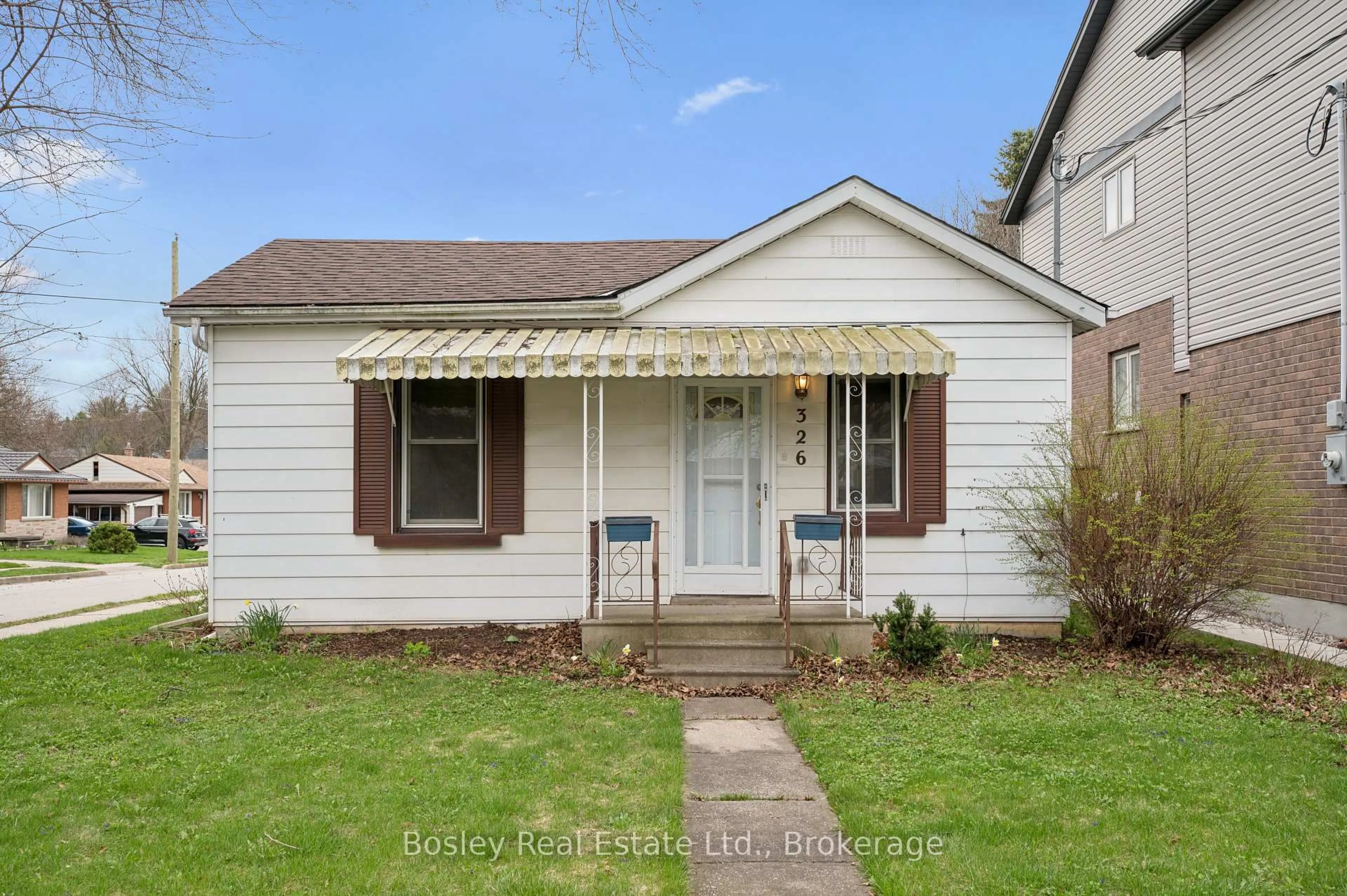 Home with vinyl exterior material, street for 326 Exhibition St, Guelph Ontario N1H 4S2