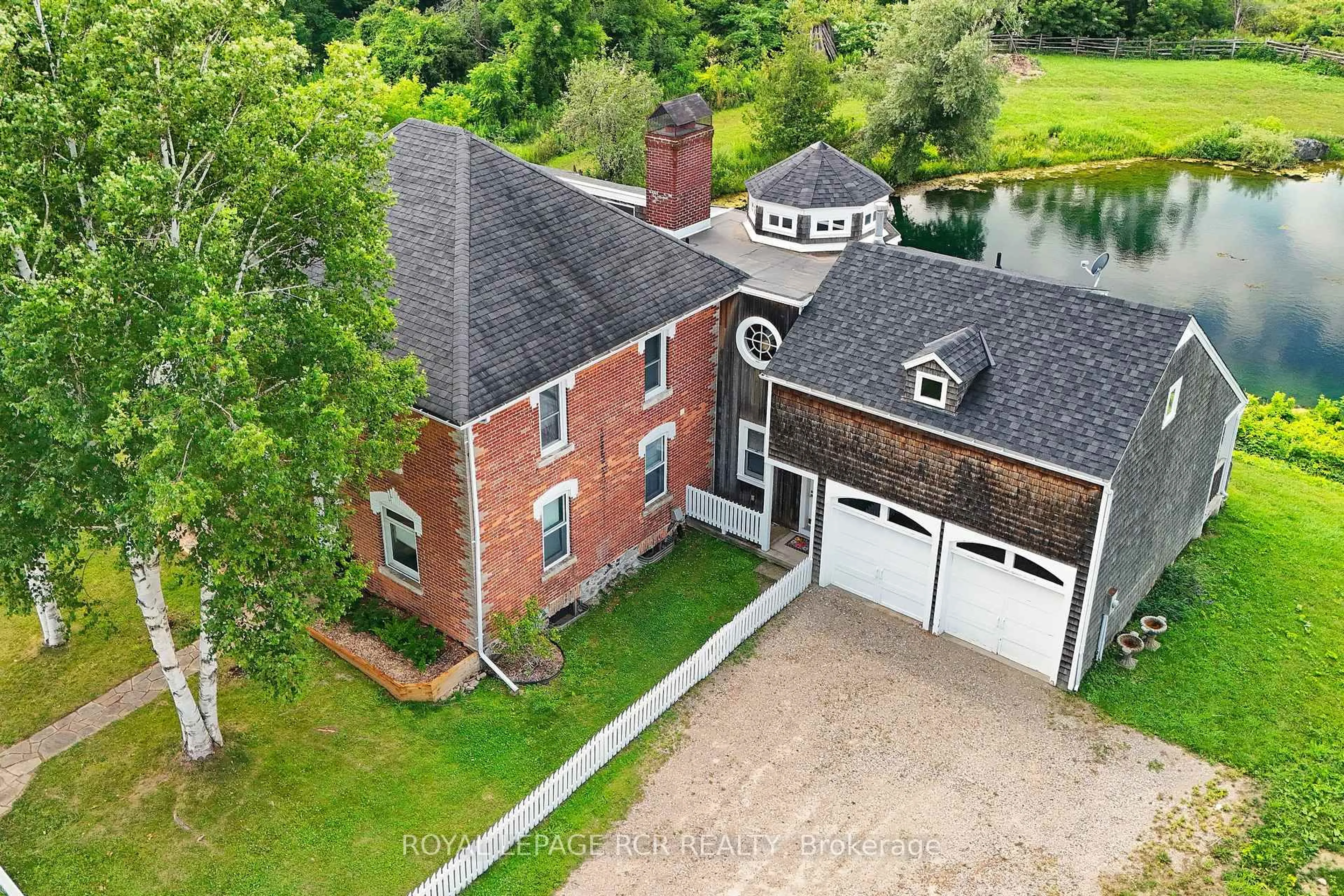 A pic from outside/outdoor area/front of a property/back of a property/a pic from drone, unknown for 836206 4th Line, Mulmur Ontario L9V 0J1