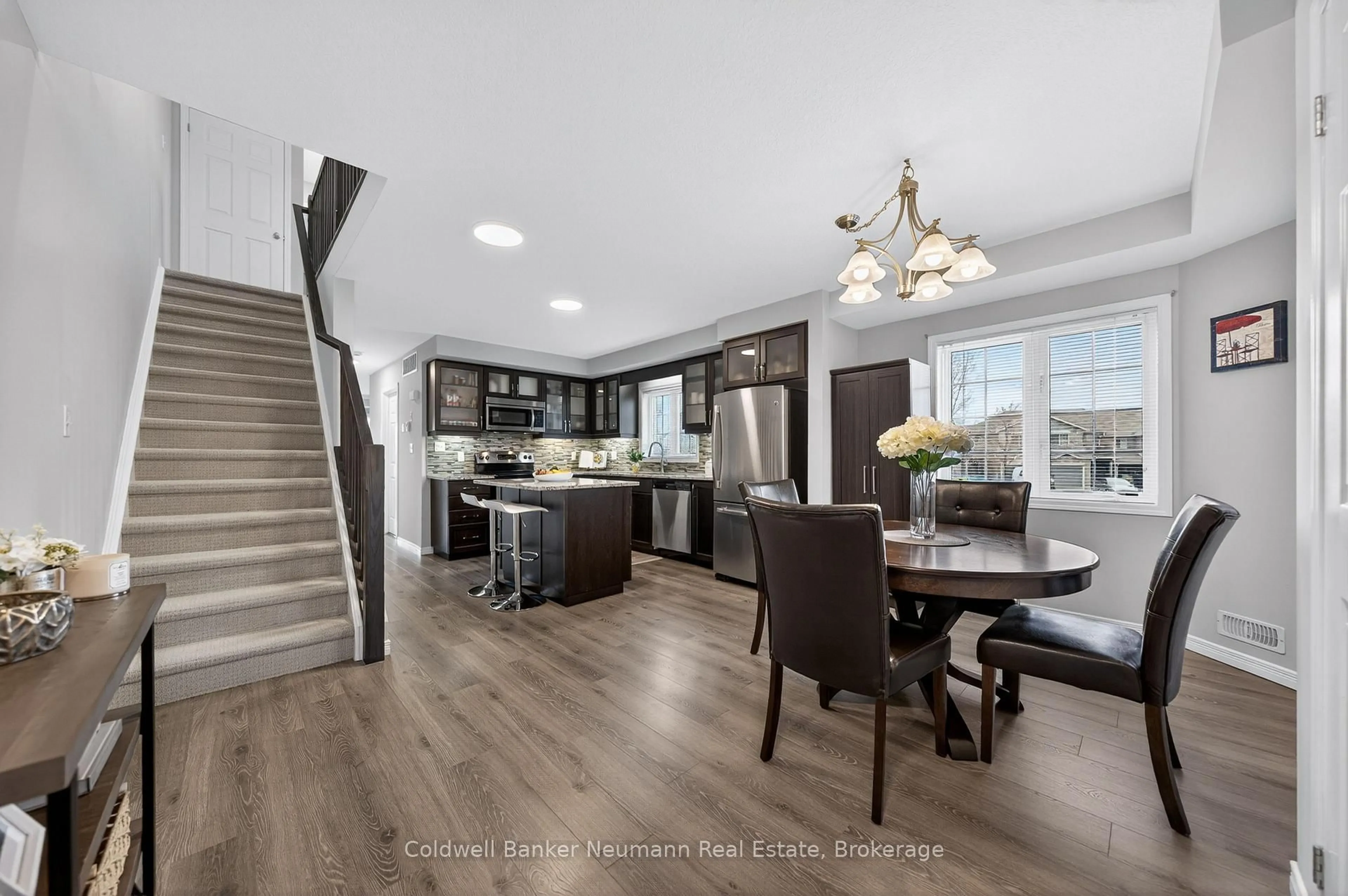 Open concept kitchen, wood/laminate floor for 388 Old Huron Rd #25C, Kitchener Ontario N2R 0J5