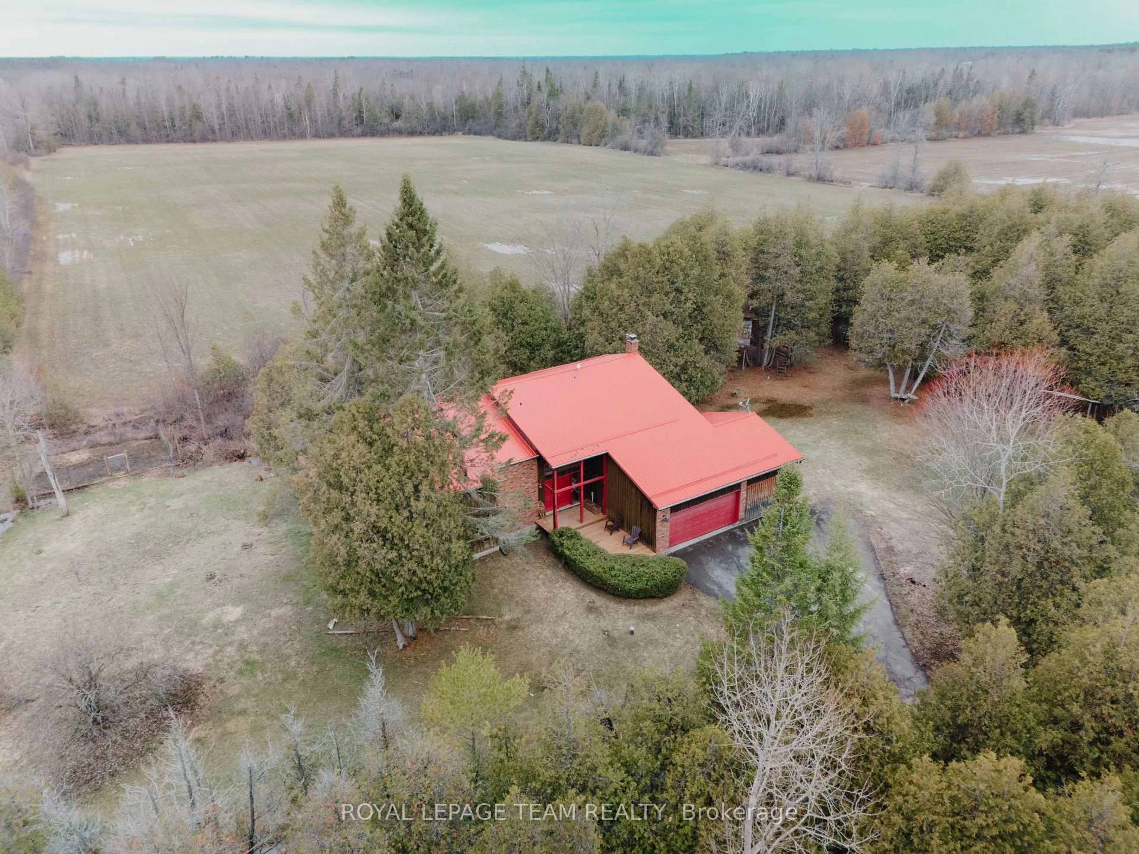 A pic from outside/outdoor area/front of a property/back of a property/a pic from drone, forest/trees view for 2249 McGovern Rd, North Grenville Ontario K0G 1S0