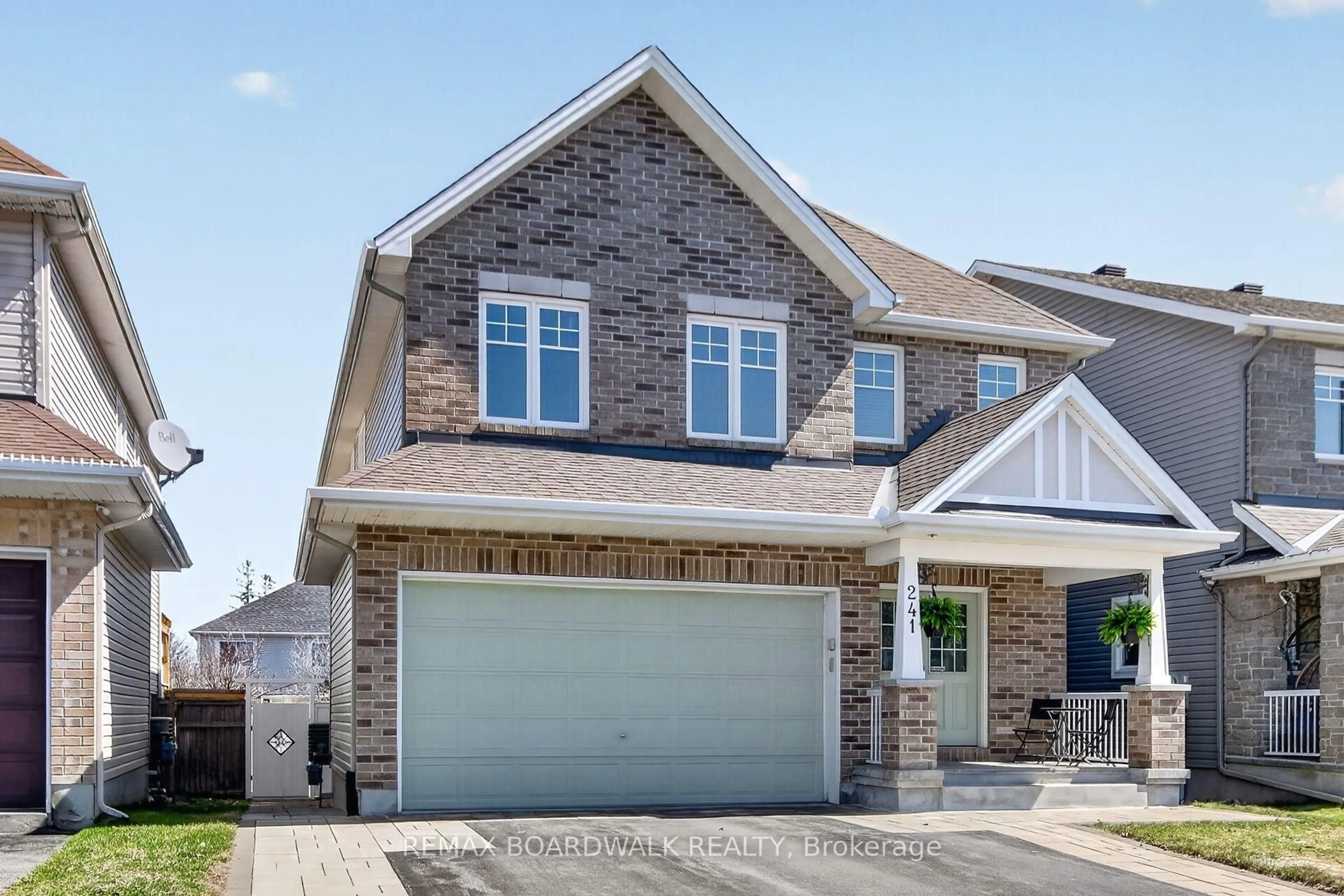 Home with brick exterior material, street for 241 Denali Way, Stittsville Ontario K2S 0N1