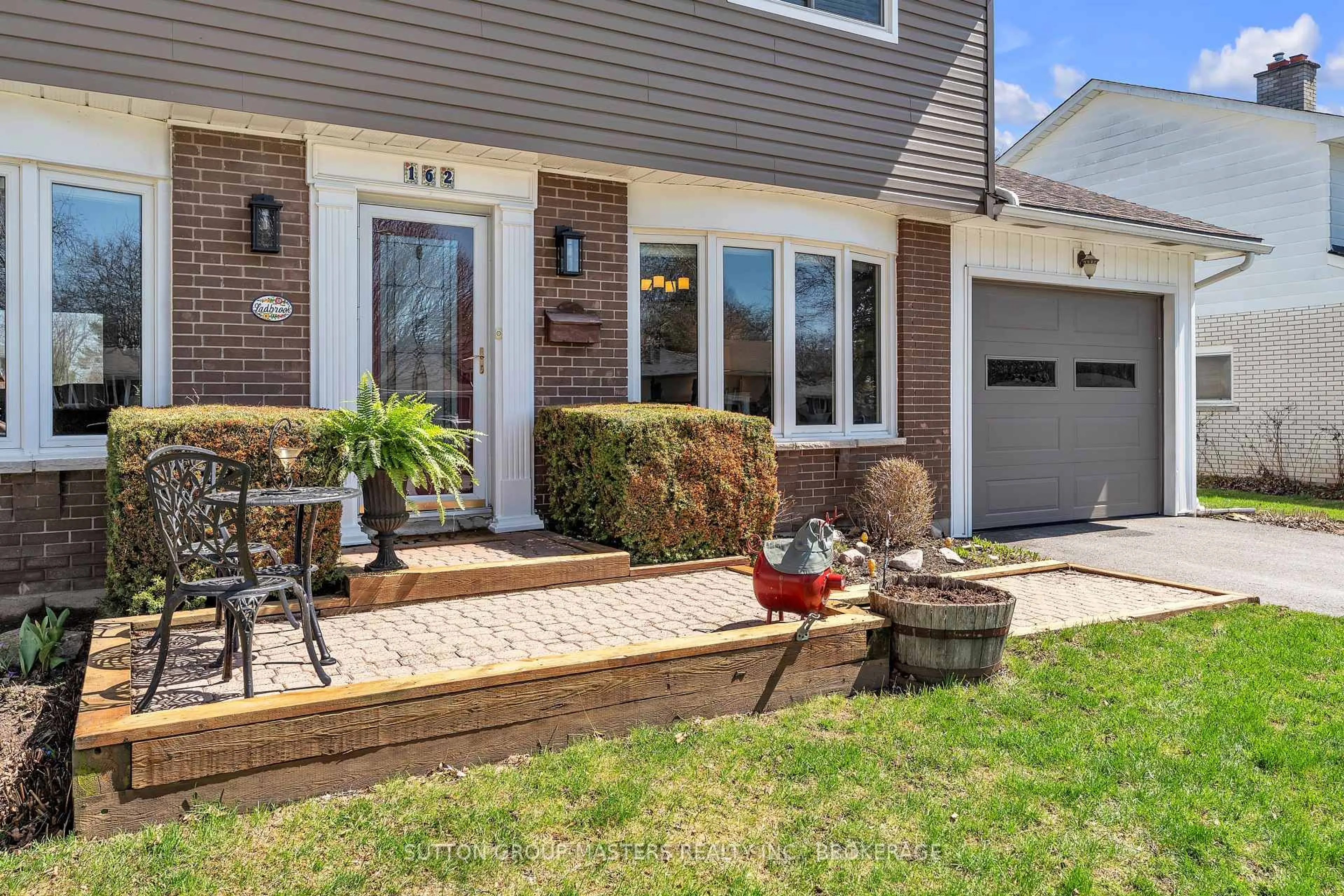 Home with brick exterior material, street for 162 Chelsea Rd, Kingston Ontario K7M 3Y8