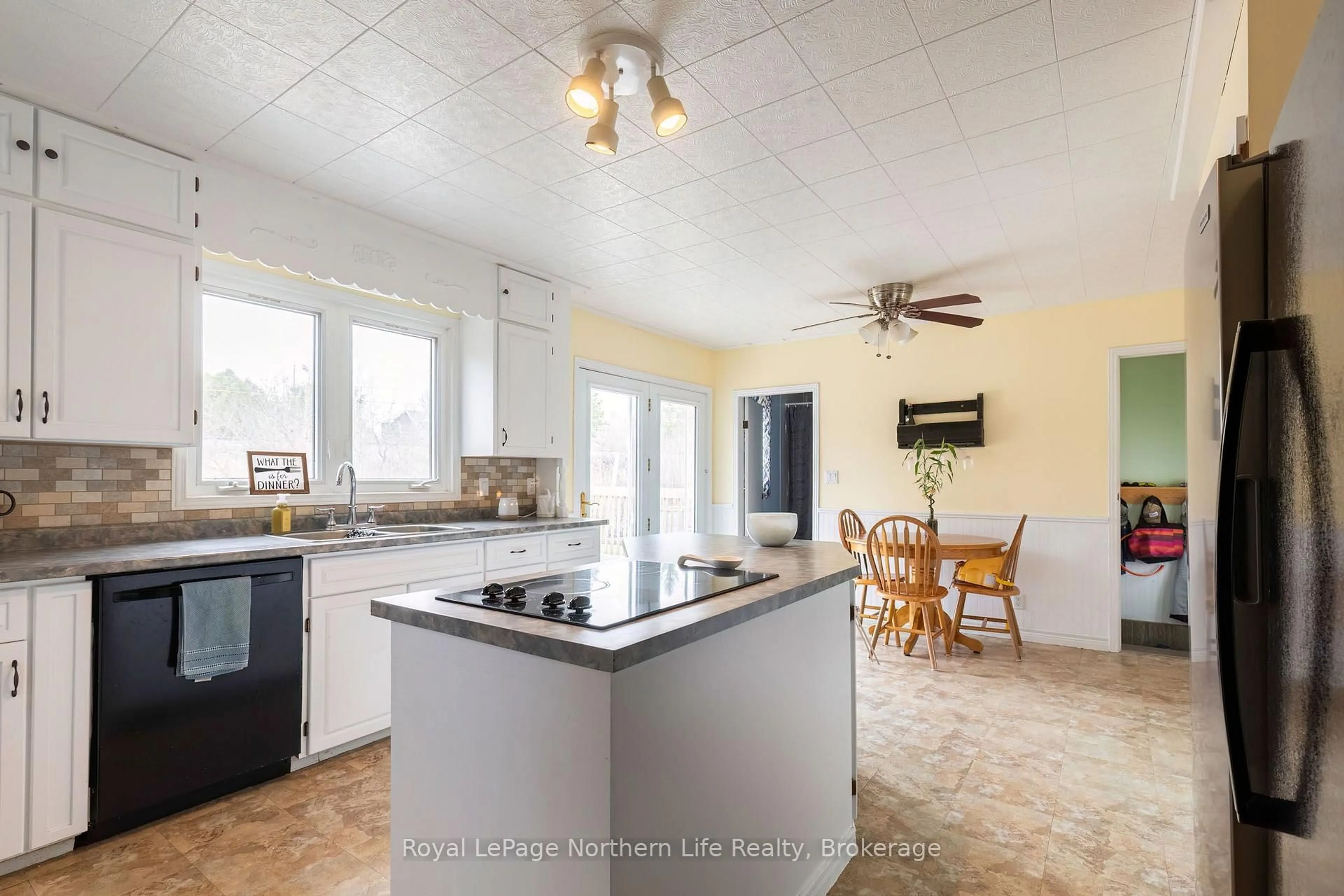 Open concept kitchen, ceramic/tile floor for 306 Spetz Ave, Powassan Ontario P0H 1Z0