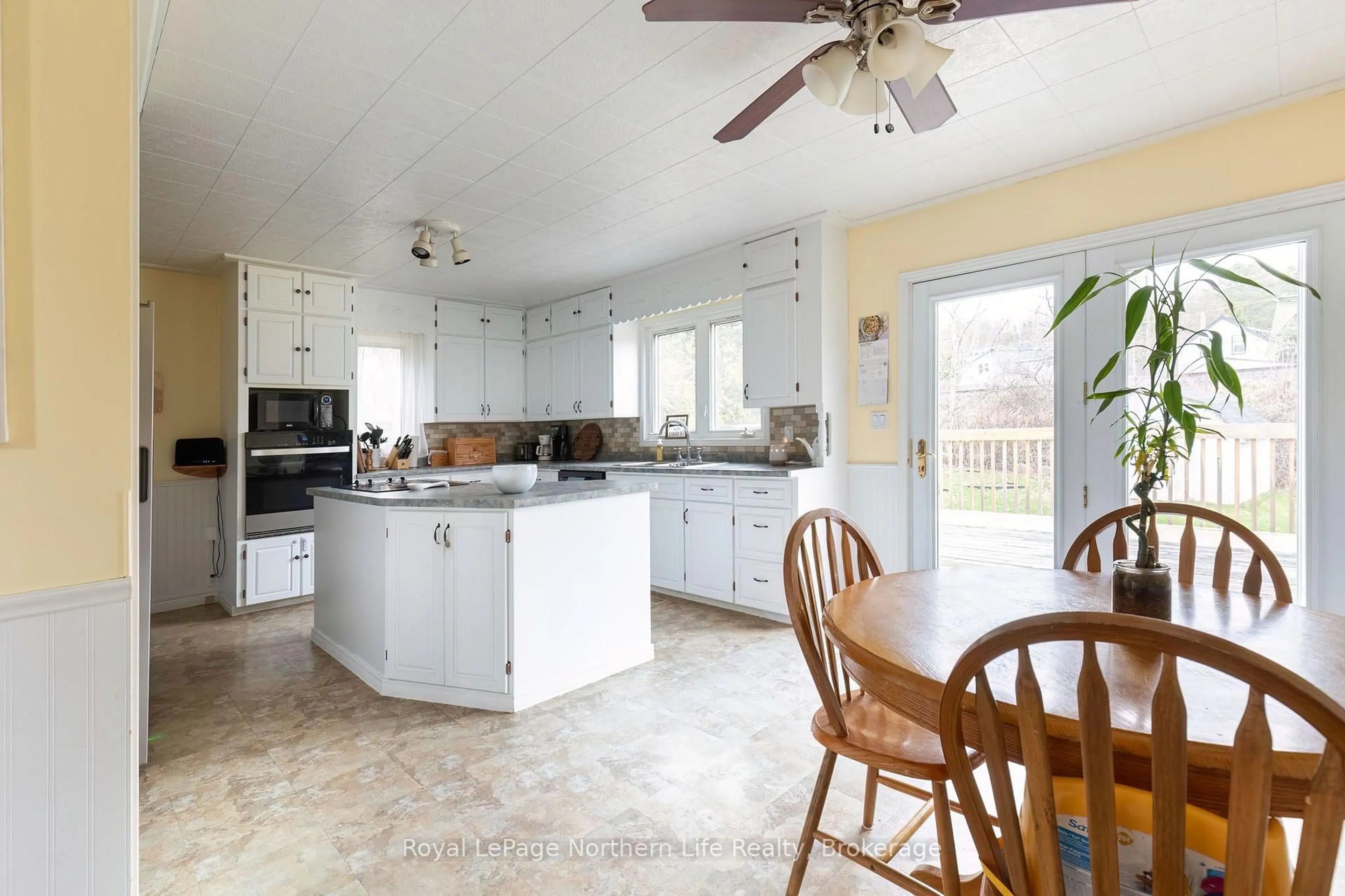 Open concept kitchen, ceramic/tile floor for 306 Spetz Ave, Powassan Ontario P0H 1Z0