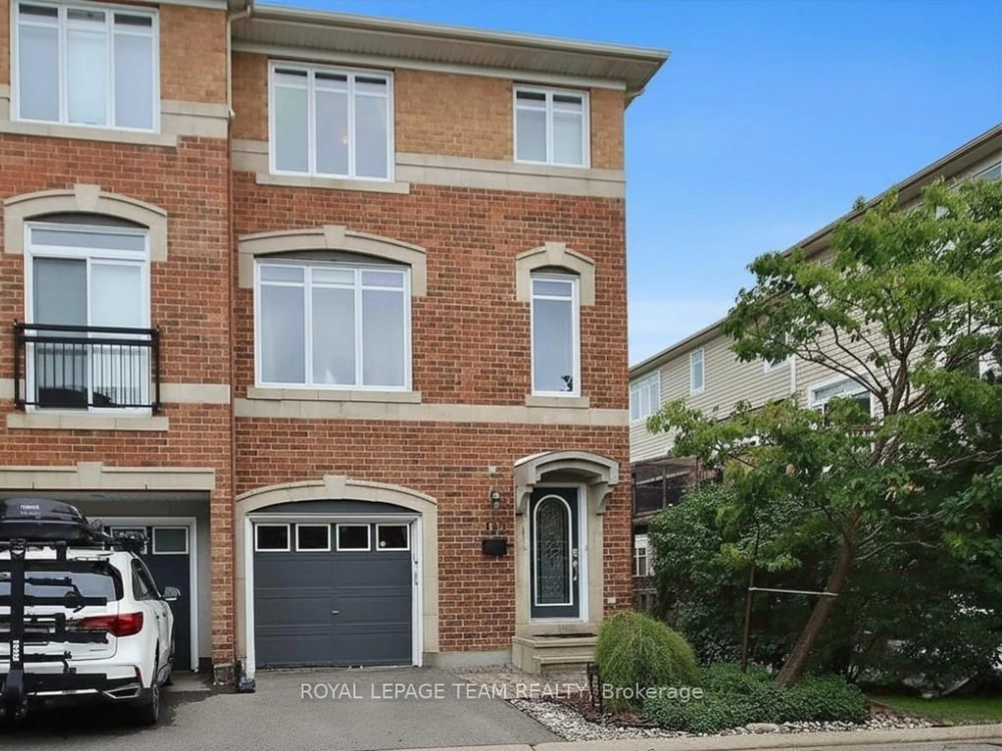 Home with brick exterior material, street for 173 West Village Private, Ottawa Ontario K1Z 1E1