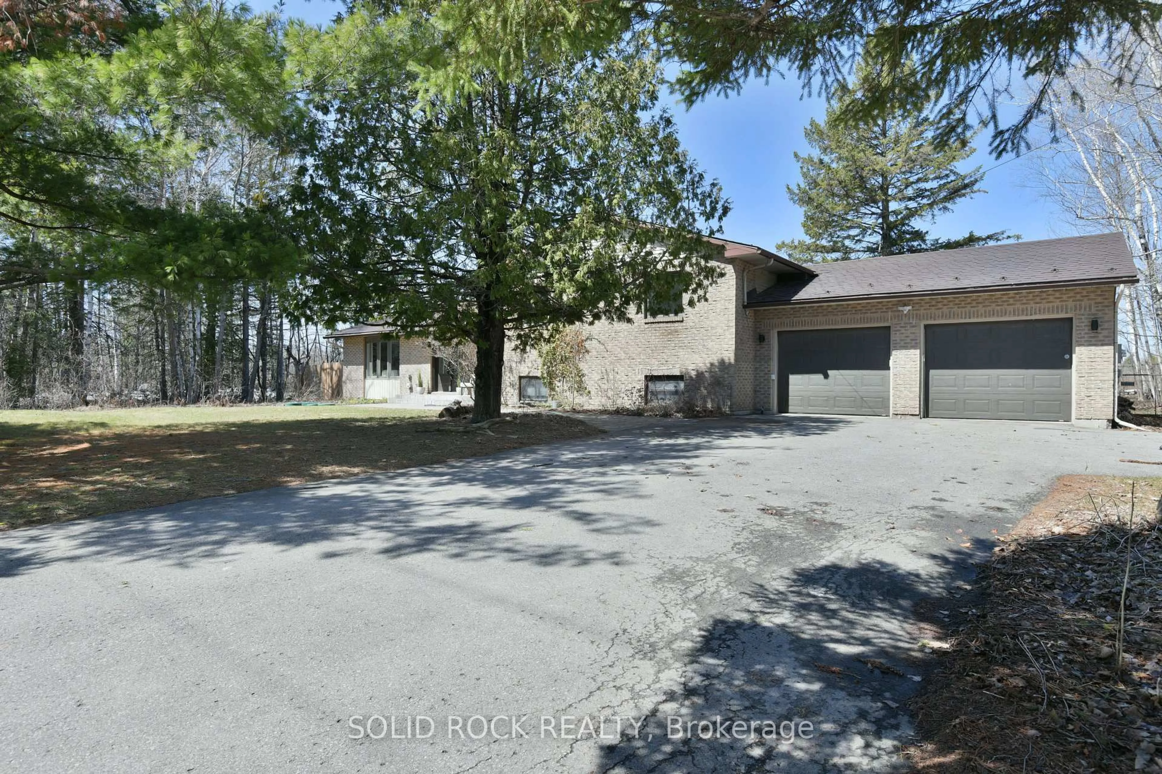 A pic from outside/outdoor area/front of a property/back of a property/a pic from drone, unknown for 6372 Rothbourne Rd, Carp Ontario K0A 1L0