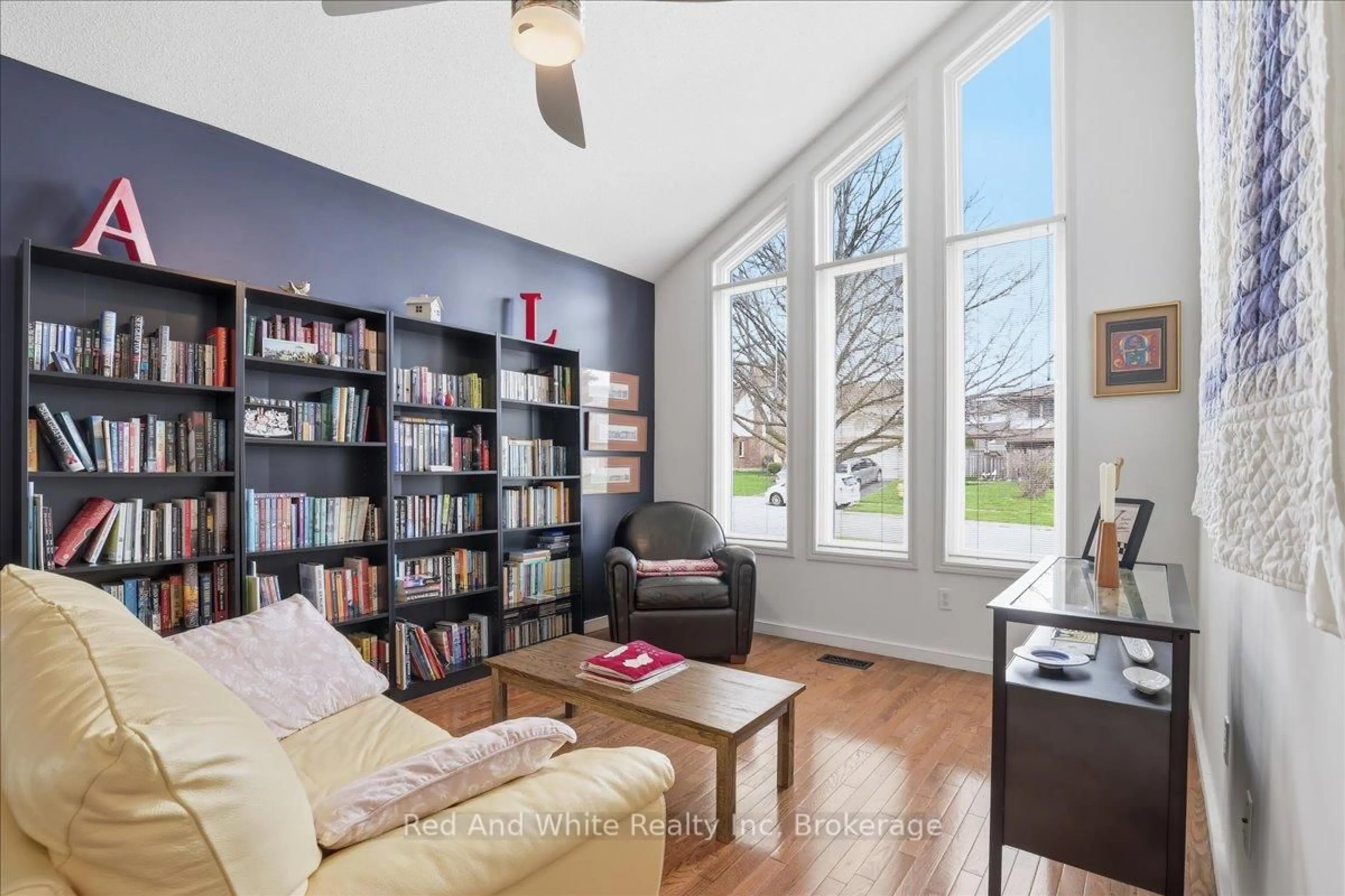 Living room with furniture, wood/laminate floor for 110 Milton Ave, Cambridge Ontario N3C 3W5