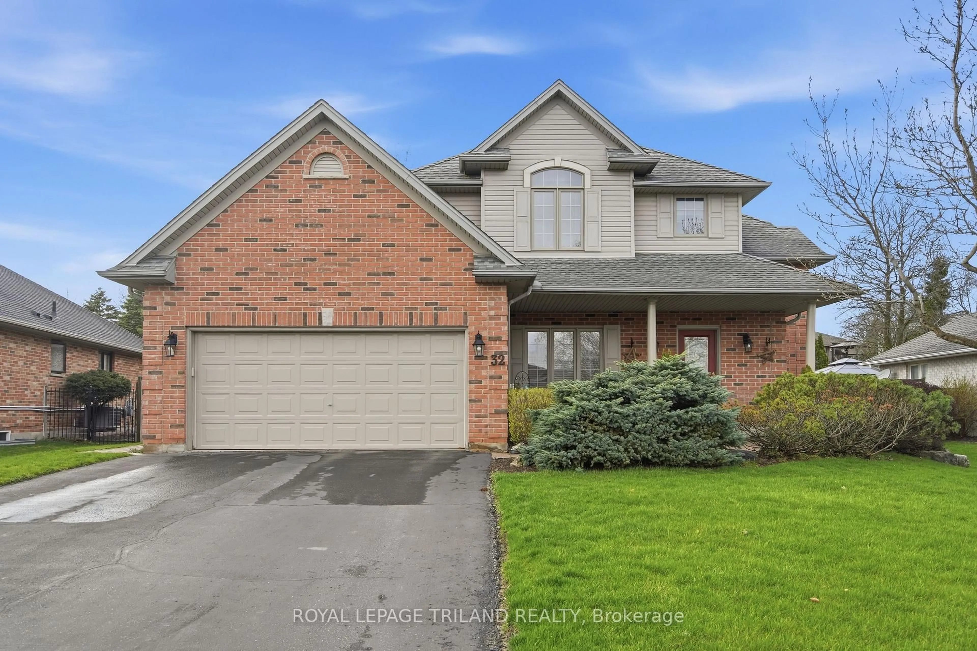 Home with brick exterior material, street for 32 Wingreen Lane, Middlesex Centre Ontario N0L 1R0