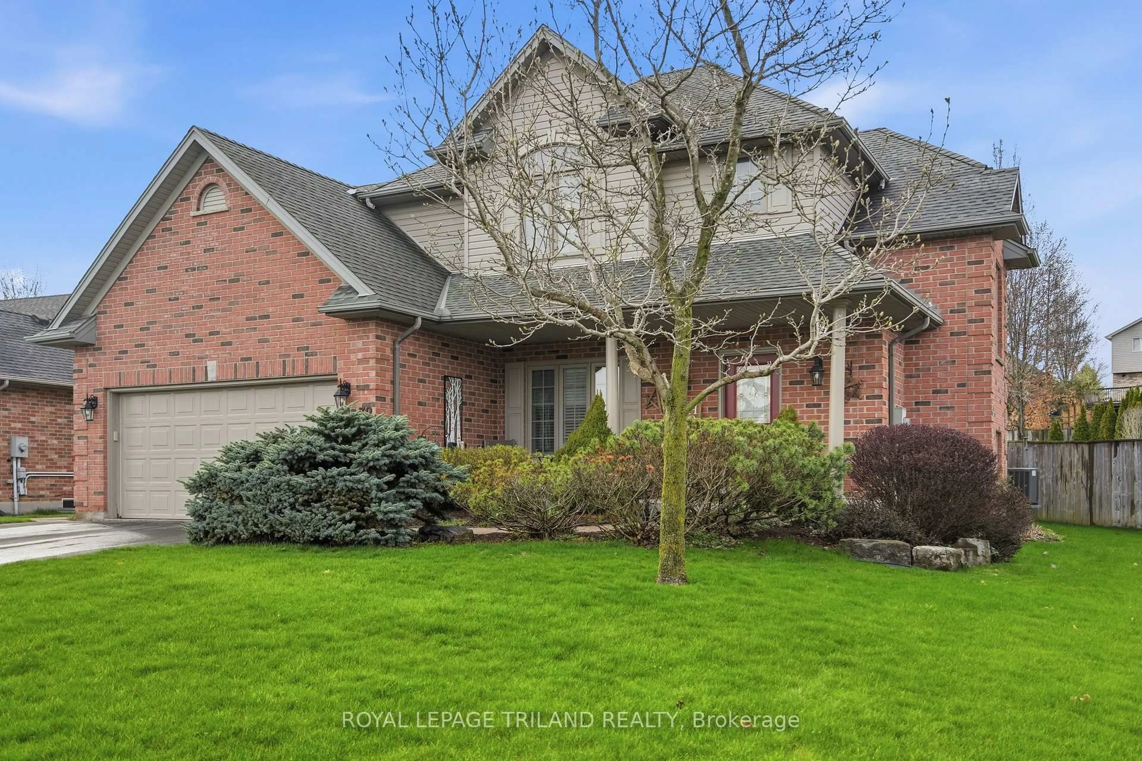 Home with brick exterior material, street for 32 Wingreen Lane, Middlesex Centre Ontario N0L 1R0