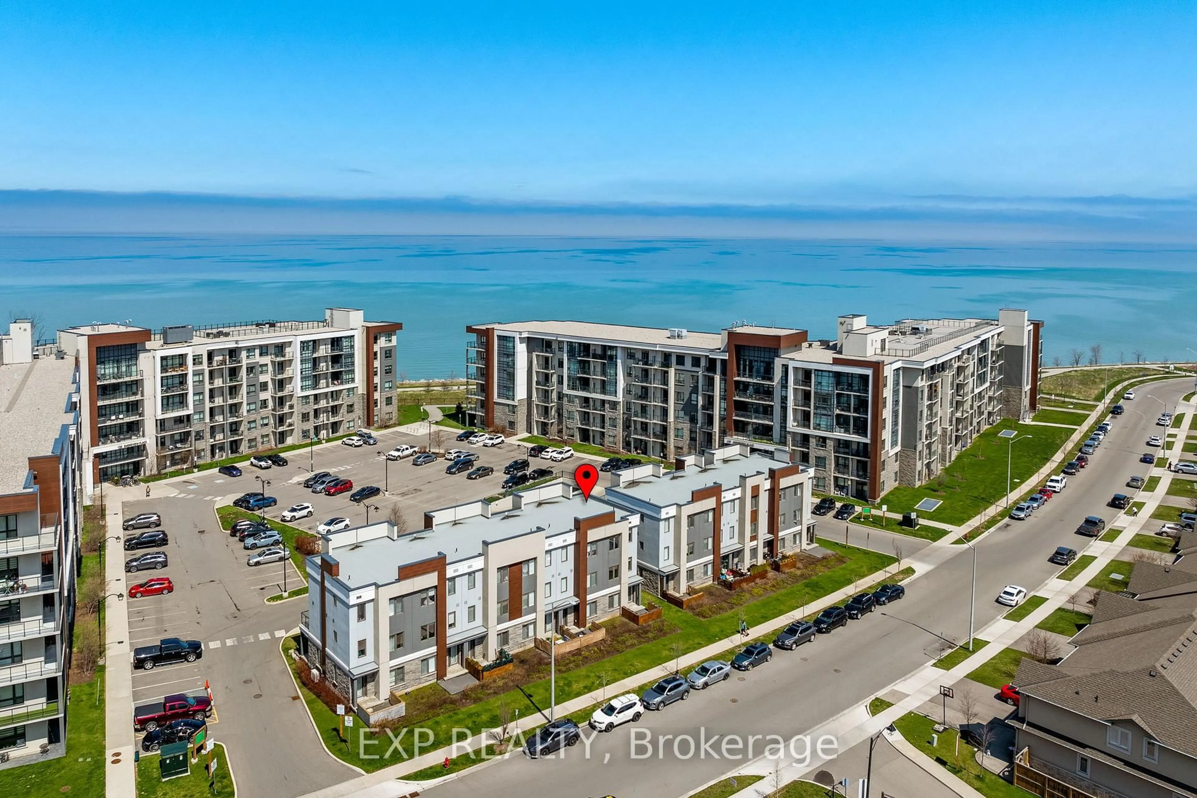 A pic from outside/outdoor area/front of a property/back of a property/a pic from drone, water/lake/river/ocean view for 115 Shoreview Pl #6, Hamilton Ontario L8E 0K4