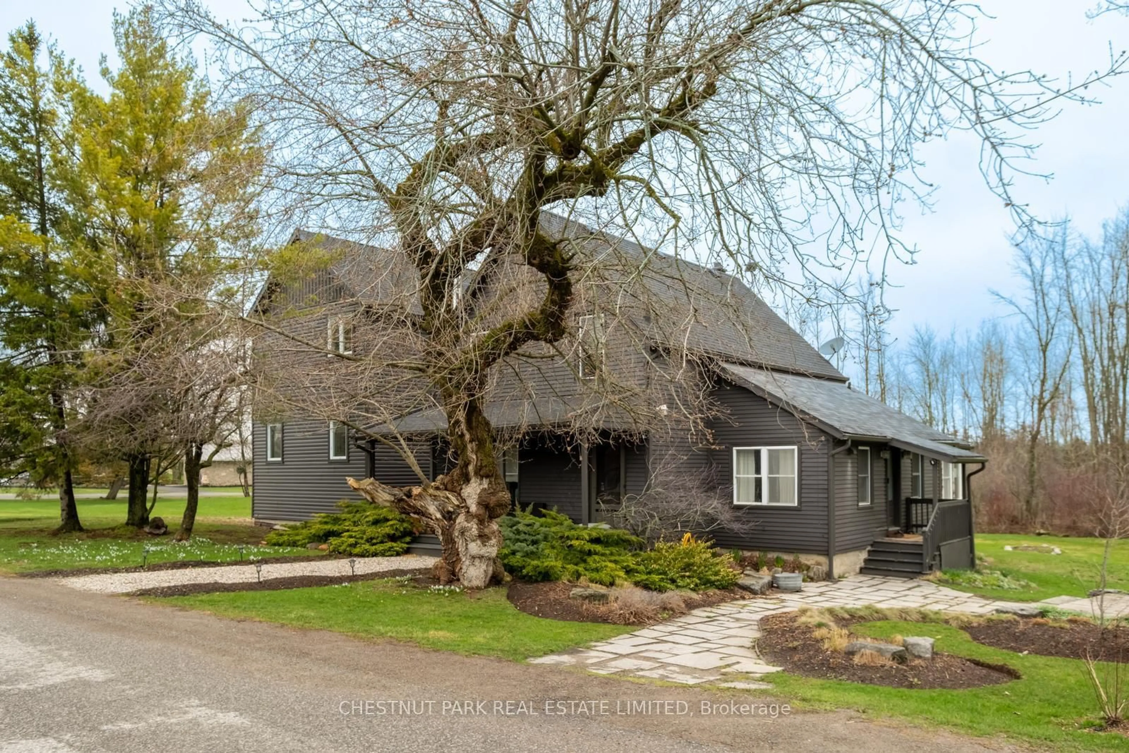 A pic from outside/outdoor area/front of a property/back of a property/a pic from drone, street for 709 Old Milford Rd, Prince Edward County Ontario K0K 2T0