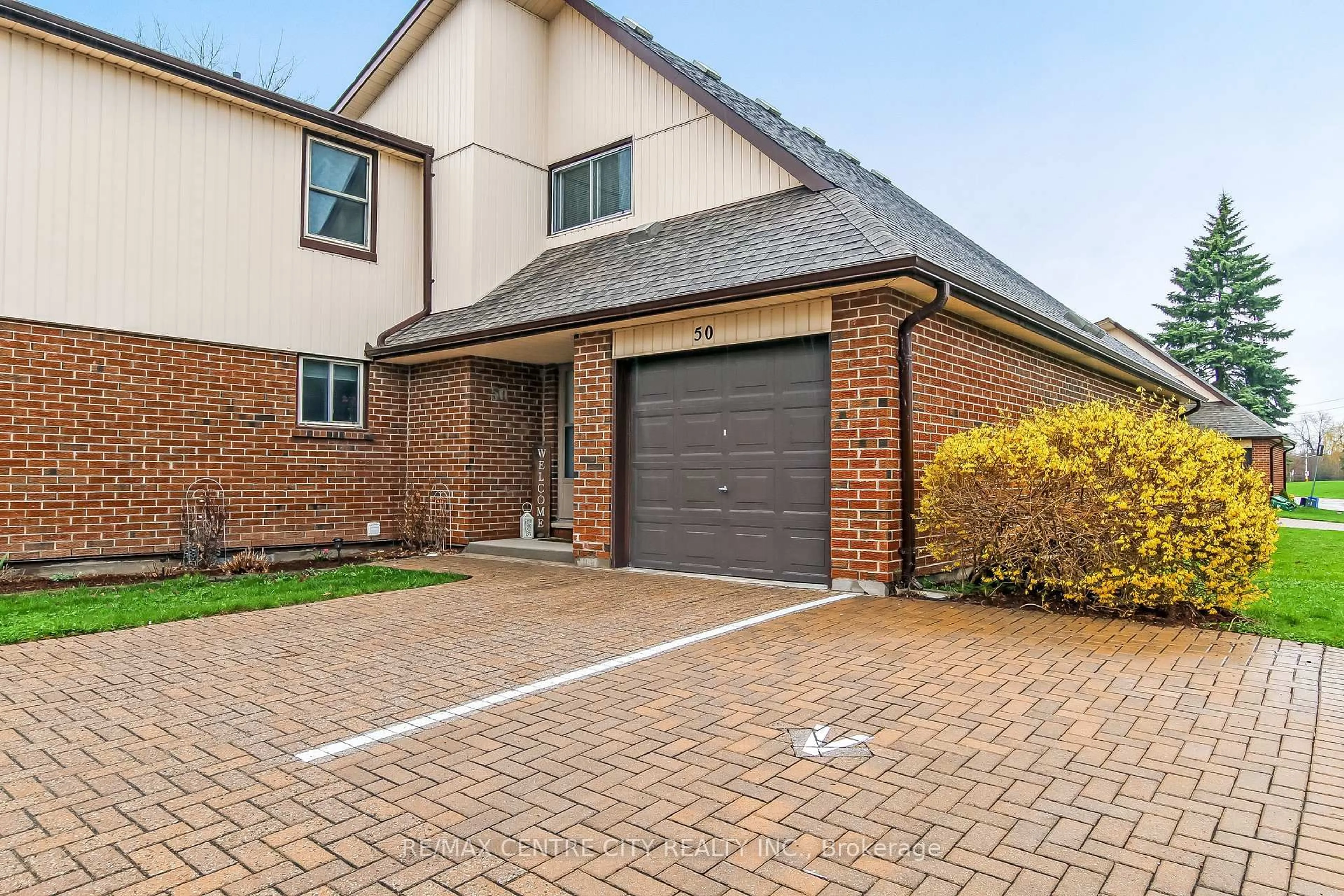 Home with brick exterior material, street for 971 Adelaide St #50, London South Ontario N6E 2H3