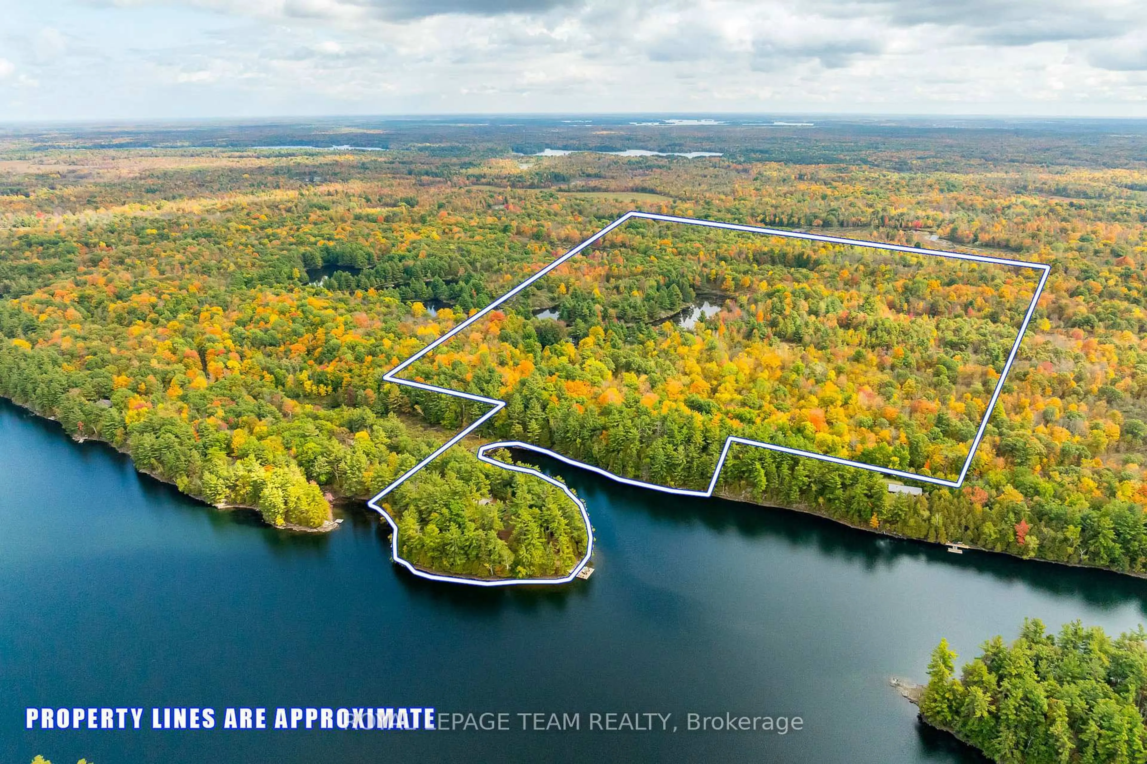 A pic from outside/outdoor area/front of a property/back of a property/a pic from drone, water/lake/river/ocean view for 998 PIKE LAKE RTE 16 Rd, Perth Ontario K7H 3C5