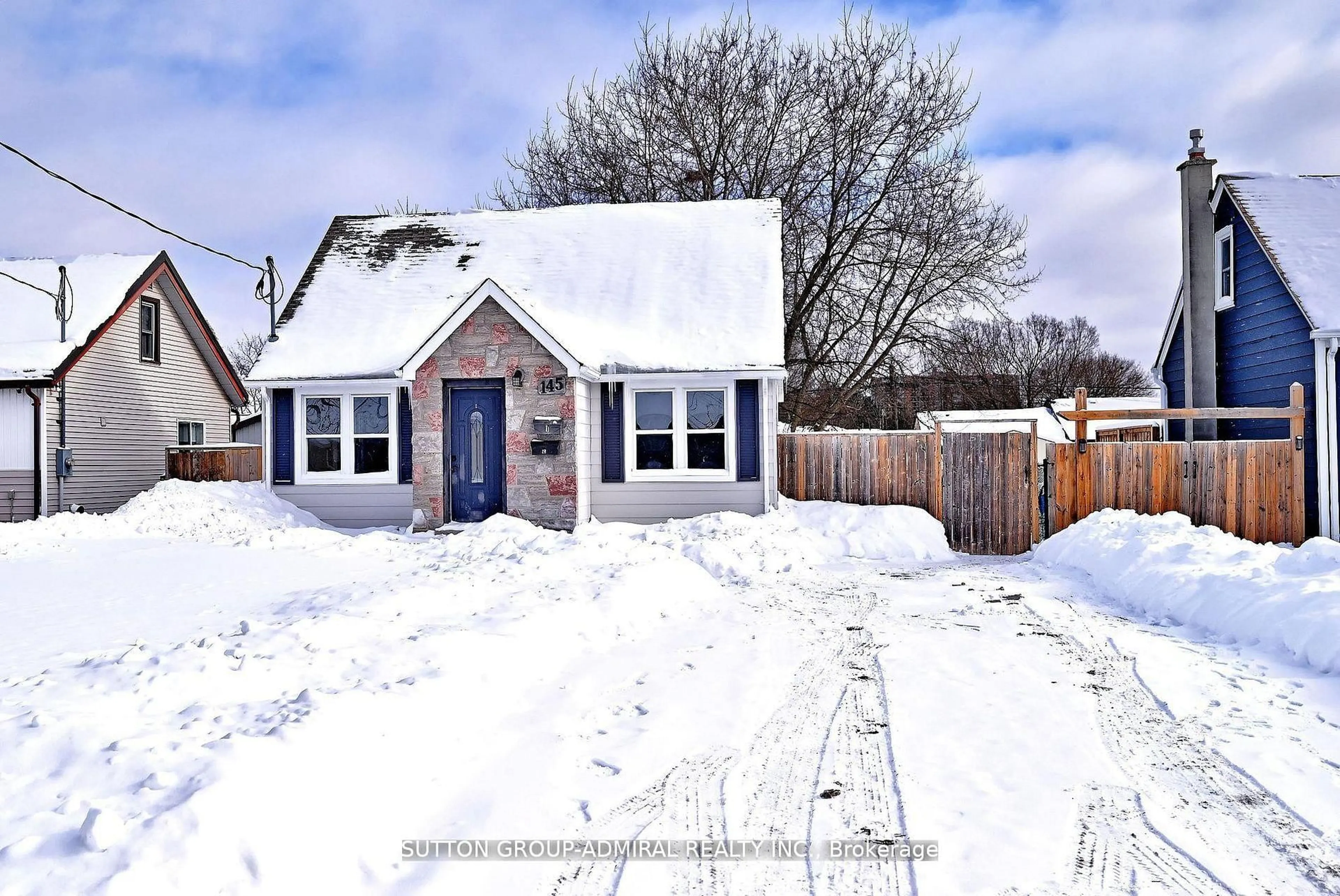 A pic from outside/outdoor area/front of a property/back of a property/a pic from drone, street for 145 Ninth Ave, Kitchener Ontario N2C 1T1