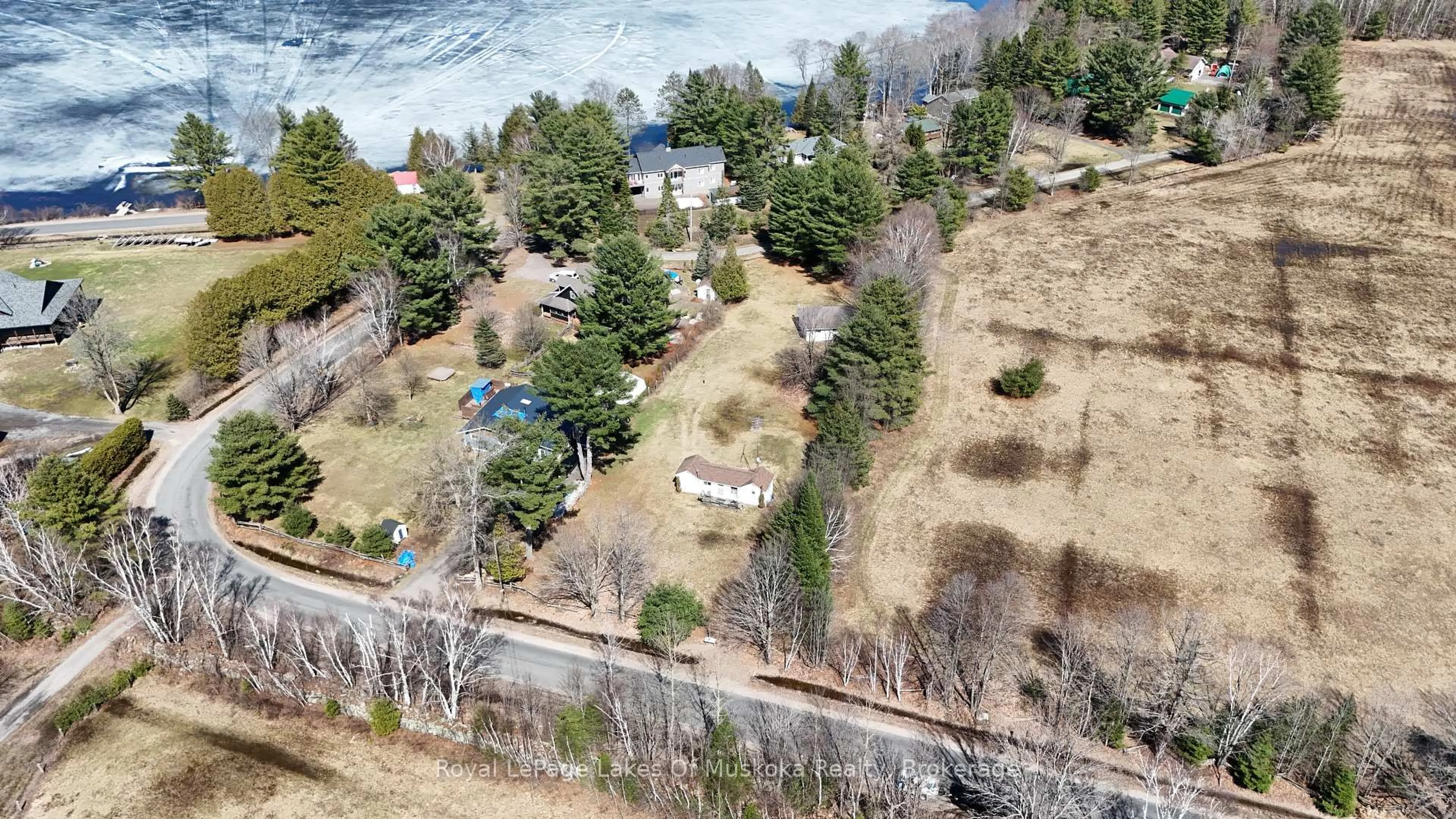 A pic from outside/outdoor area/front of a property/back of a property/a pic from drone, water/lake/river/ocean view for 1080 St. Peter's Rd, Algonquin Highlands Ontario K0M 2K0