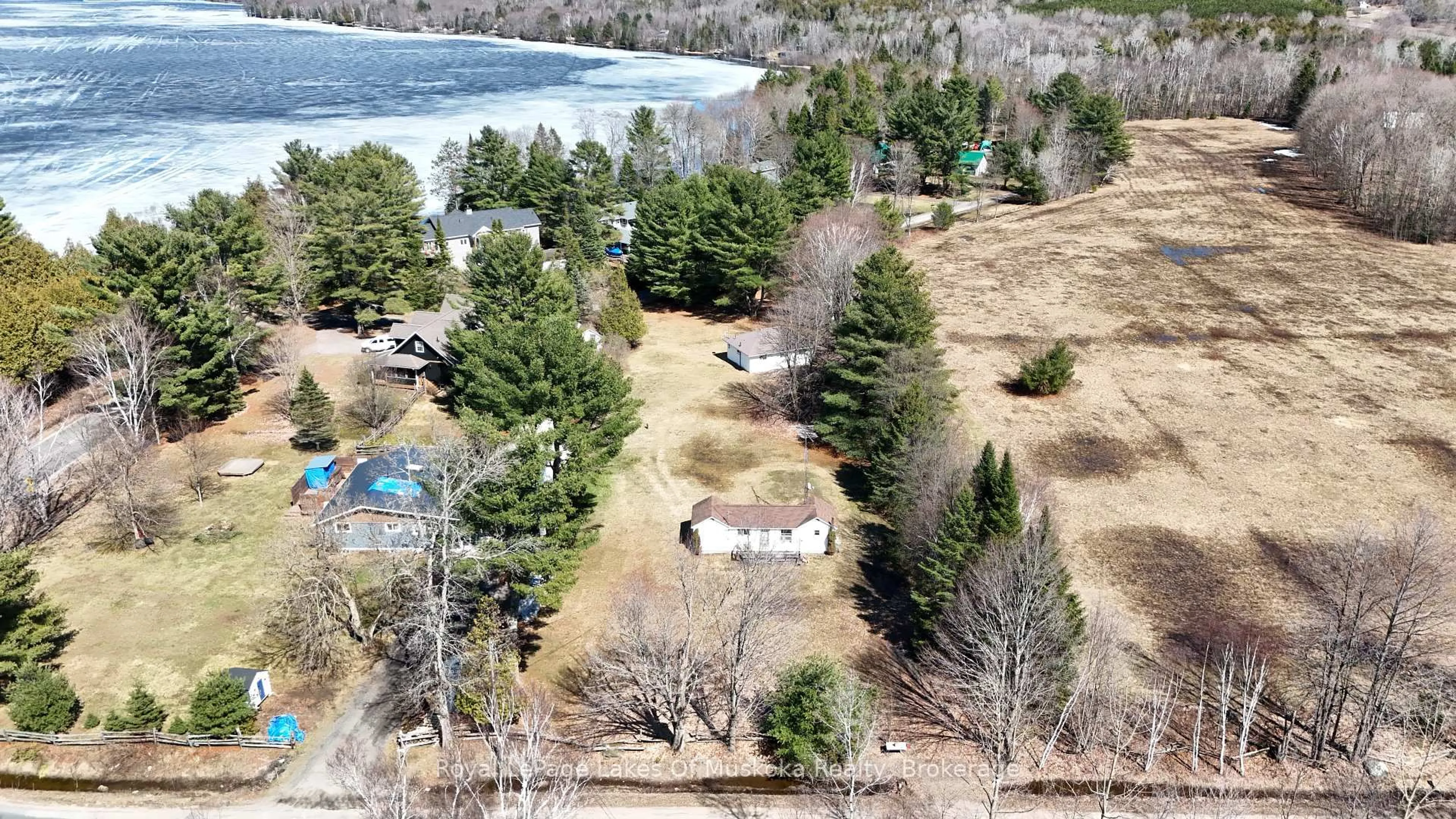 A pic from outside/outdoor area/front of a property/back of a property/a pic from drone, water/lake/river/ocean view for 1080 St. Peter's Rd, Algonquin Highlands Ontario K0M 2K0