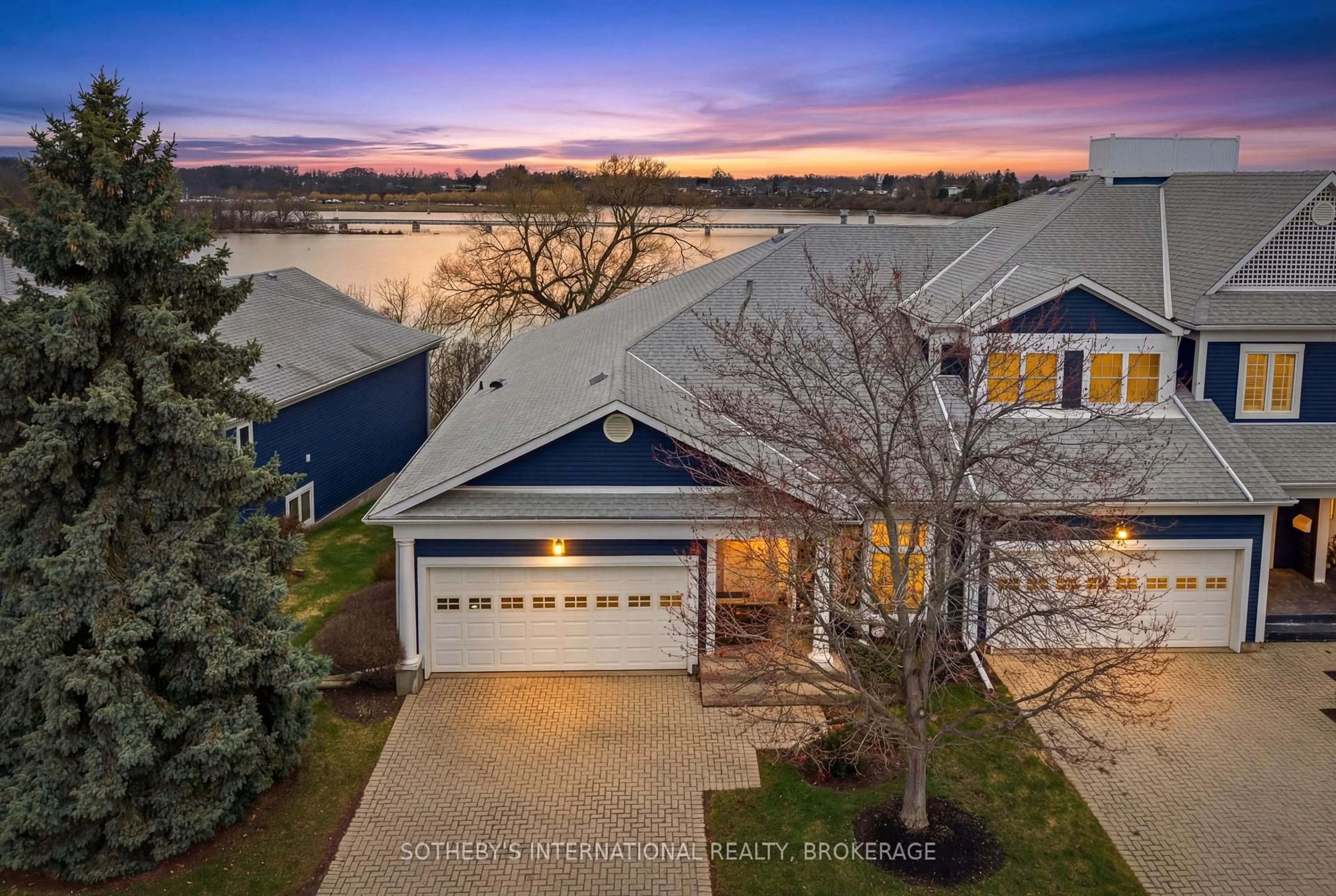 A pic from outside/outdoor area/front of a property/back of a property/a pic from drone, water/lake/river/ocean view for 88 Lakeport Rd #15, St. Catharines Ontario L2N 4P8