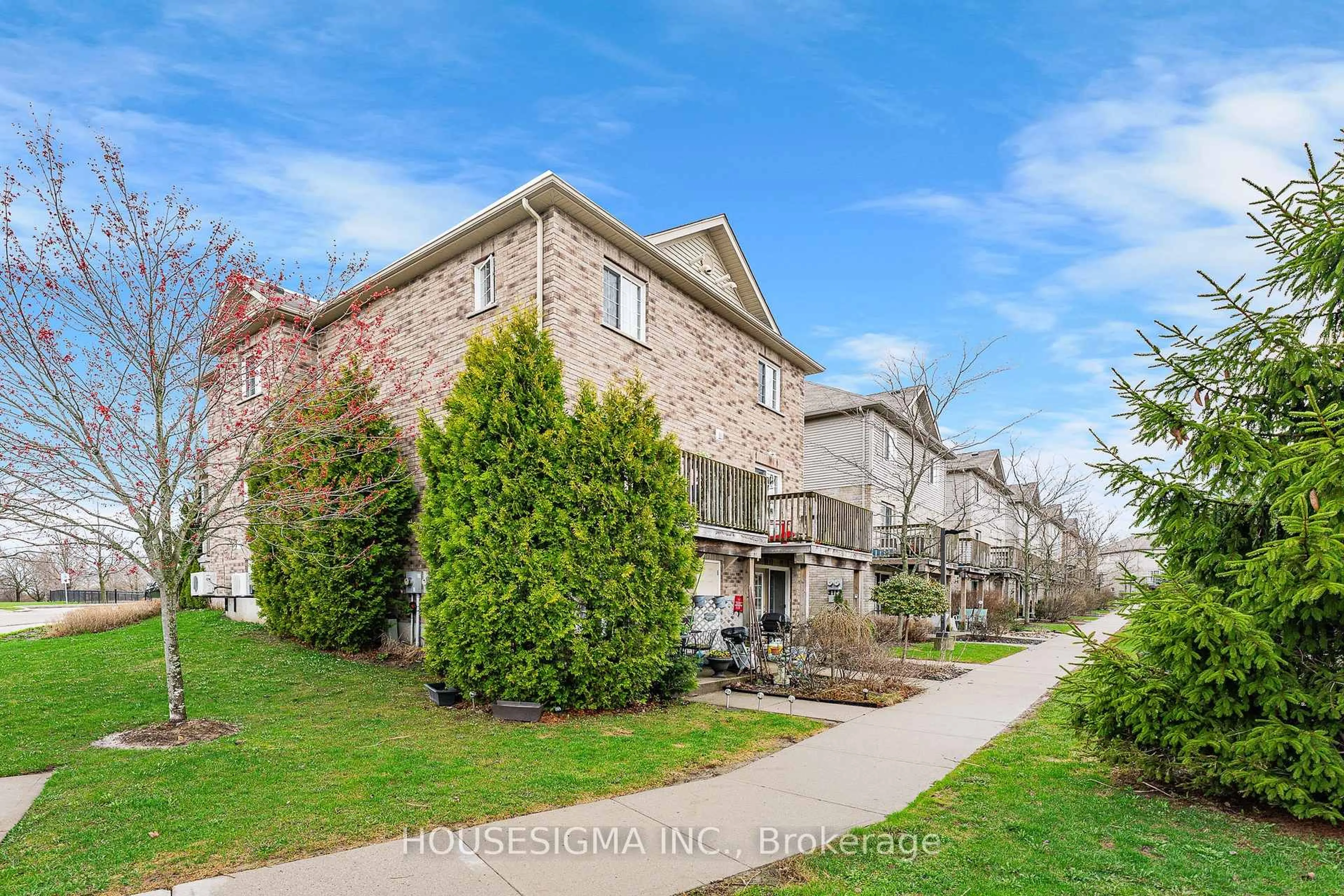 A pic from outside/outdoor area/front of a property/back of a property/a pic from drone, street for 35 Mountford Dr #124, Guelph Ontario N1E 0G6