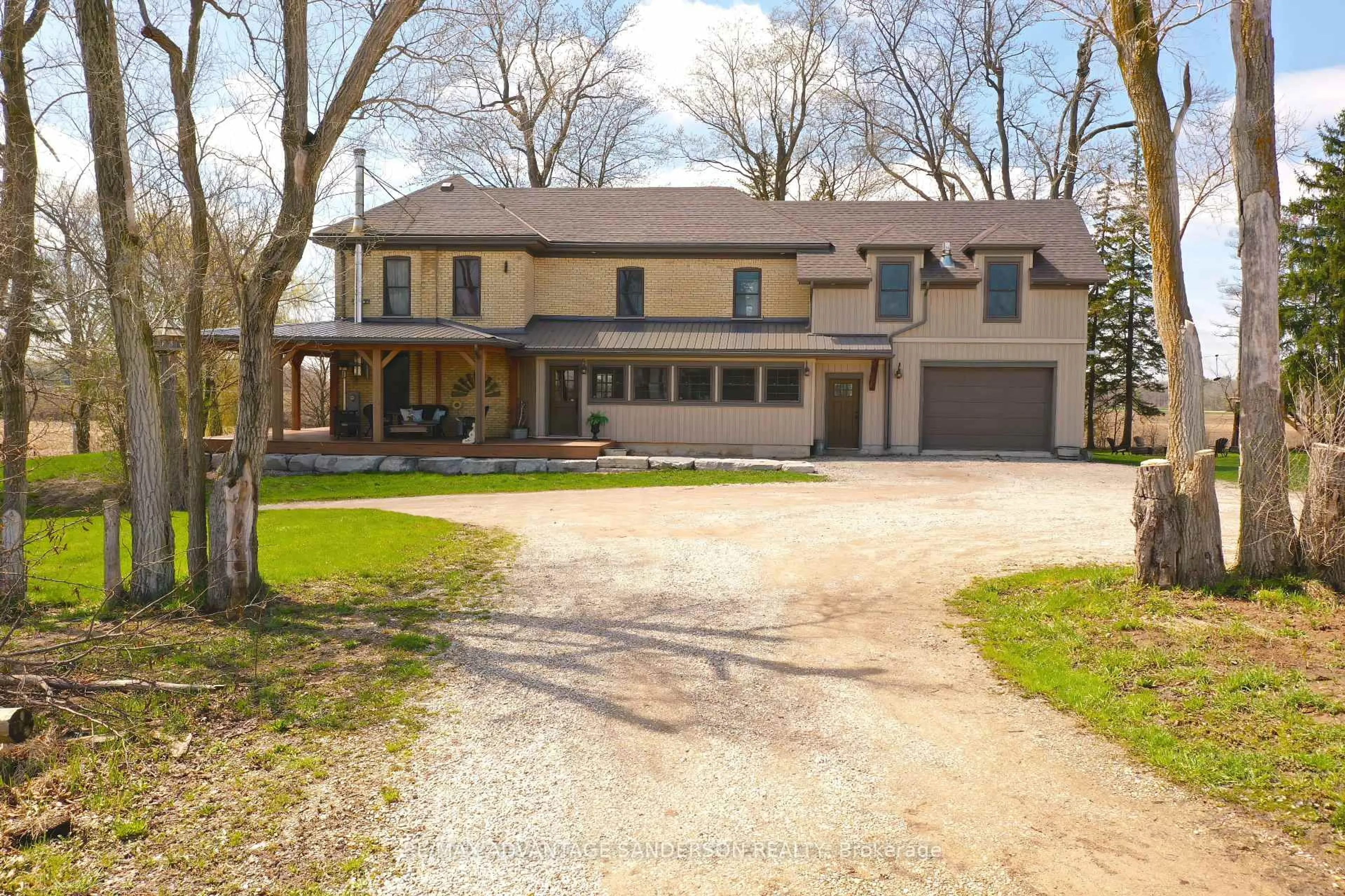 A pic from outside/outdoor area/front of a property/back of a property/a pic from drone, street for 12486 Medway Rd, Middlesex Centre Ontario N0M 1C0