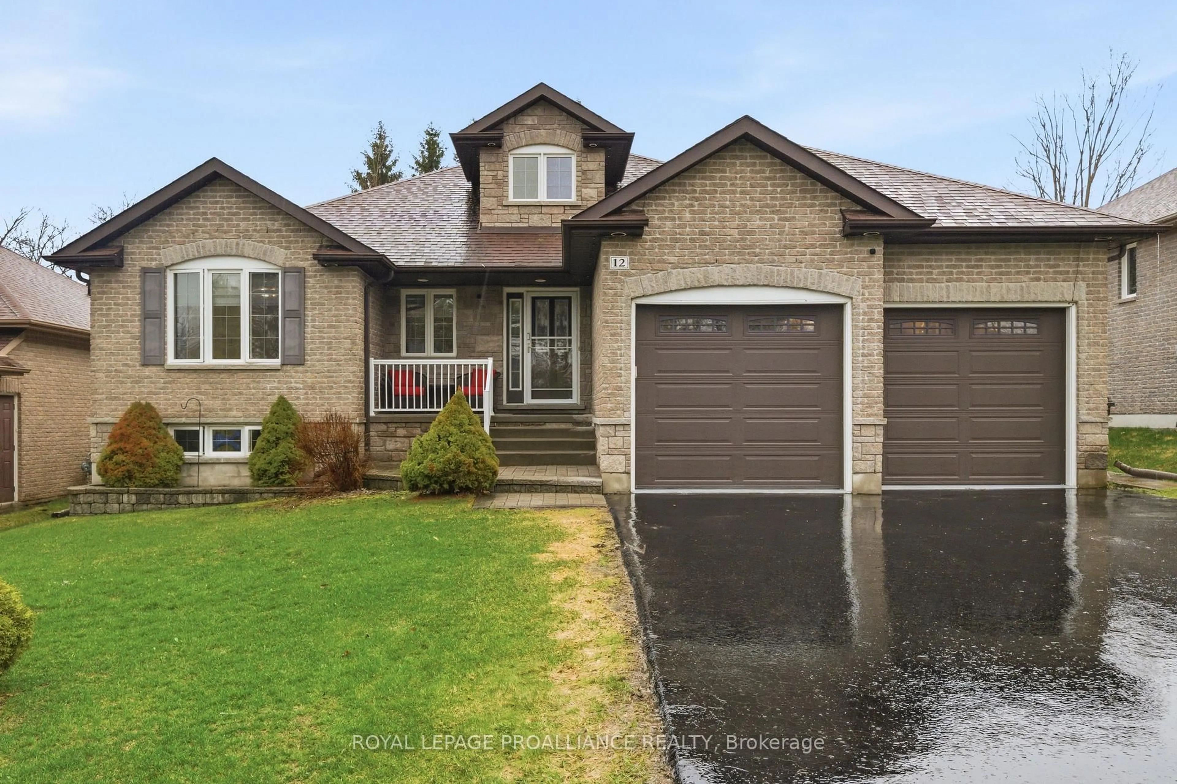 Home with brick exterior material, street for 12 Pine Marsh Lane, Quinte West Ontario K8V 0A5