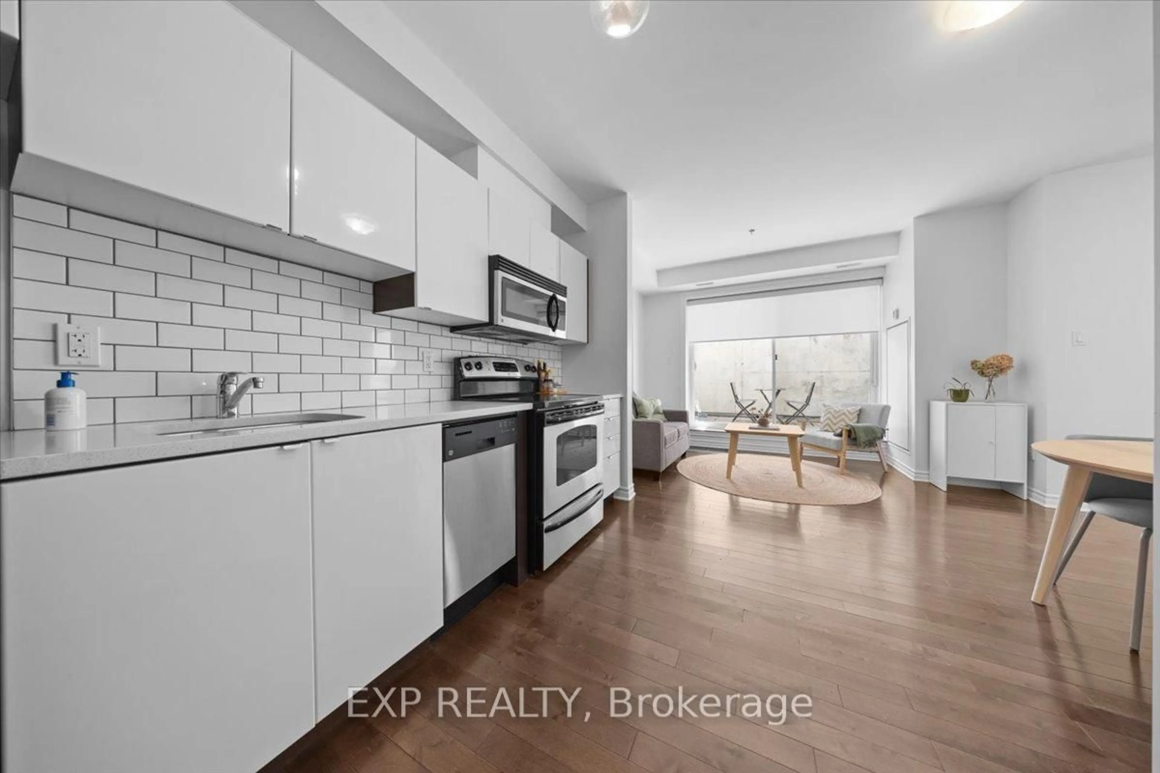 Open concept kitchen, ceramic/tile floor for 429 Kent St #121, Ottawa Ontario K2P 1B5