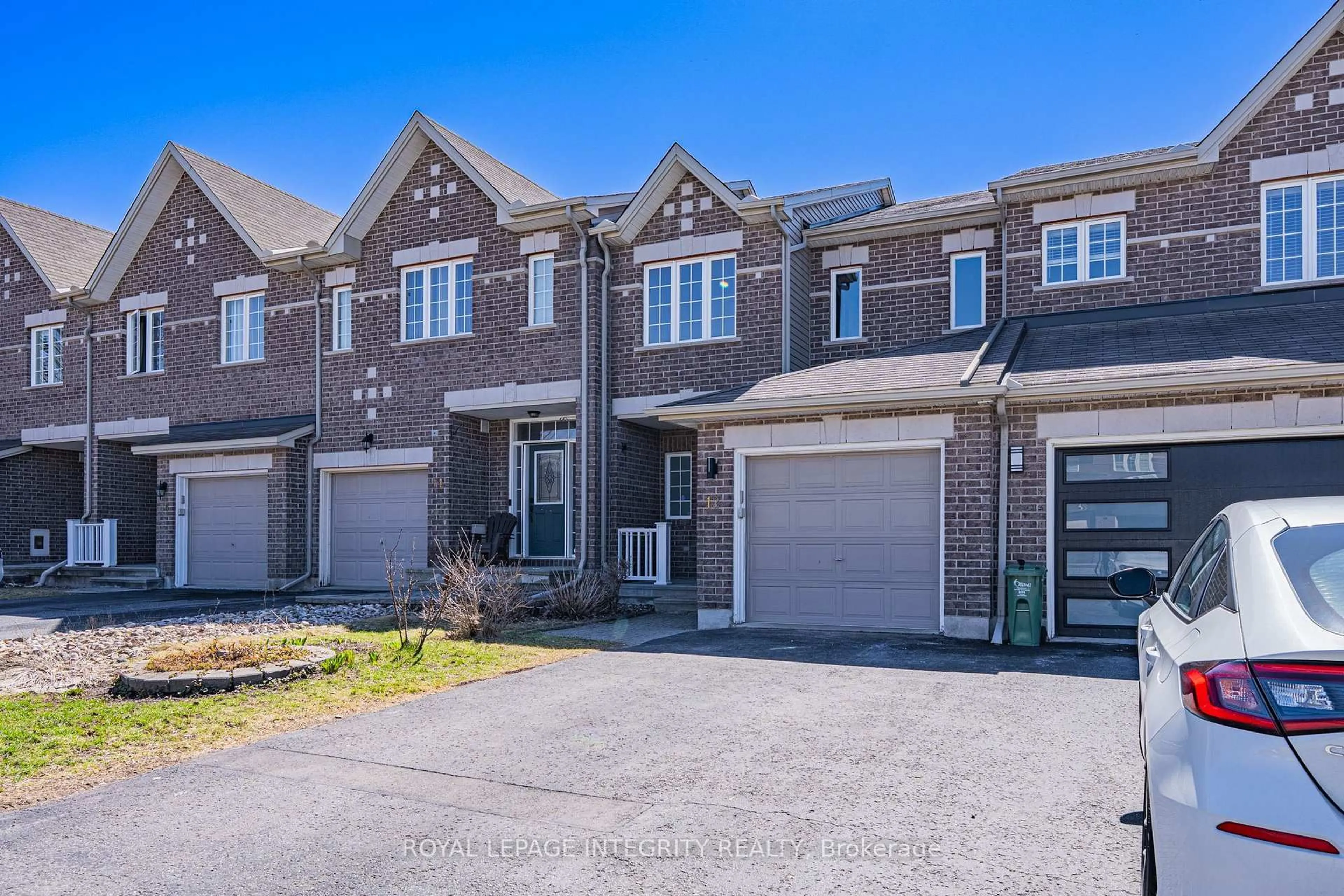 Home with brick exterior material, street for 12 Saddlesmith Circ, Ottawa Ontario K2M 2S4