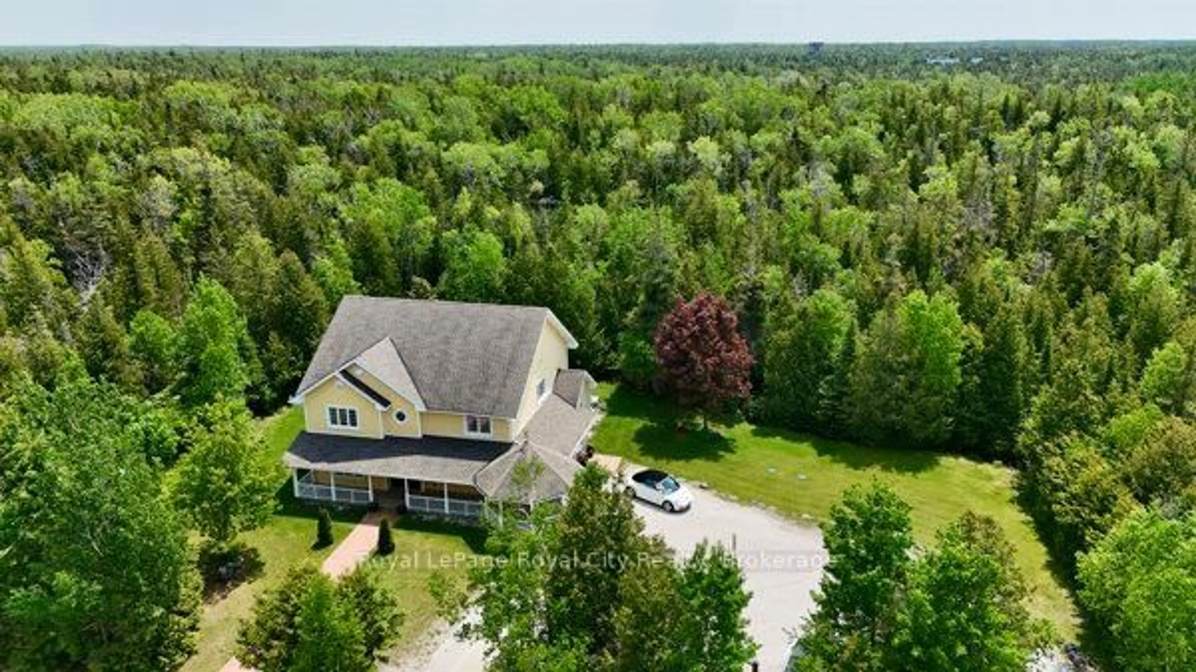 A pic from outside/outdoor area/front of a property/back of a property/a pic from drone, forest/trees view for 13 Elgin St, Northern Bruce Peninsula Ontario N0H 2R0