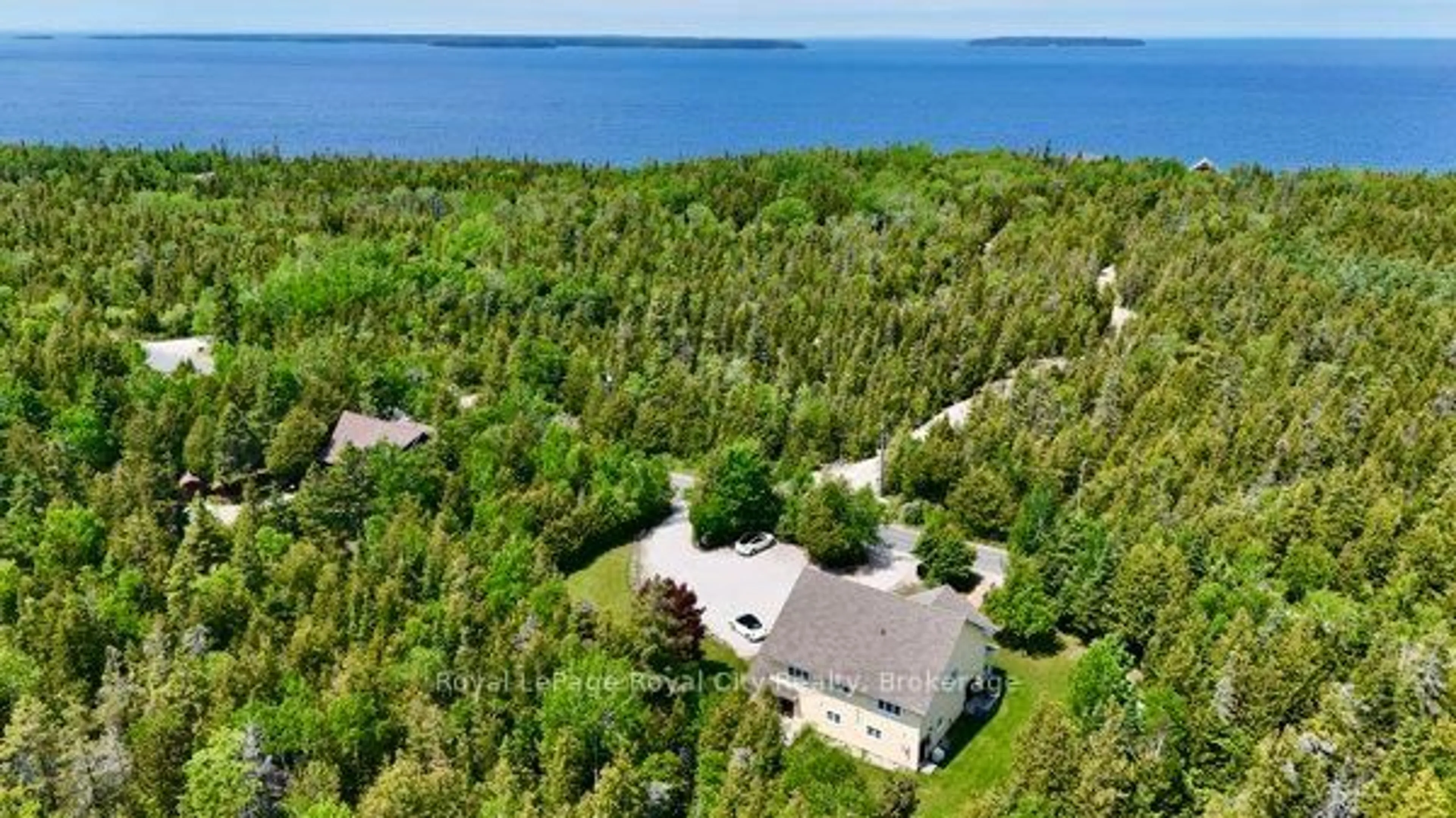A pic from outside/outdoor area/front of a property/back of a property/a pic from drone, water/lake/river/ocean view for 13 Elgin St, Northern Bruce Peninsula Ontario N0H 2R0