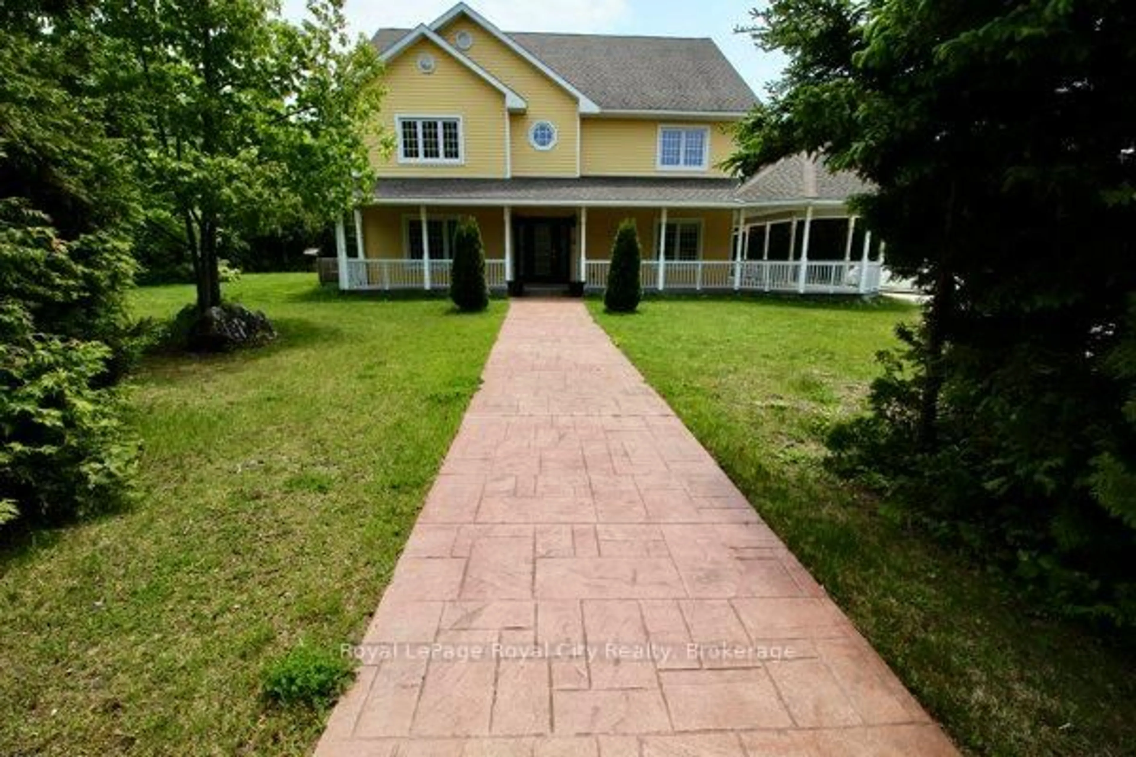 A pic from outside/outdoor area/front of a property/back of a property/a pic from drone, street for 13 Elgin St, Northern Bruce Peninsula Ontario N0H 2R0