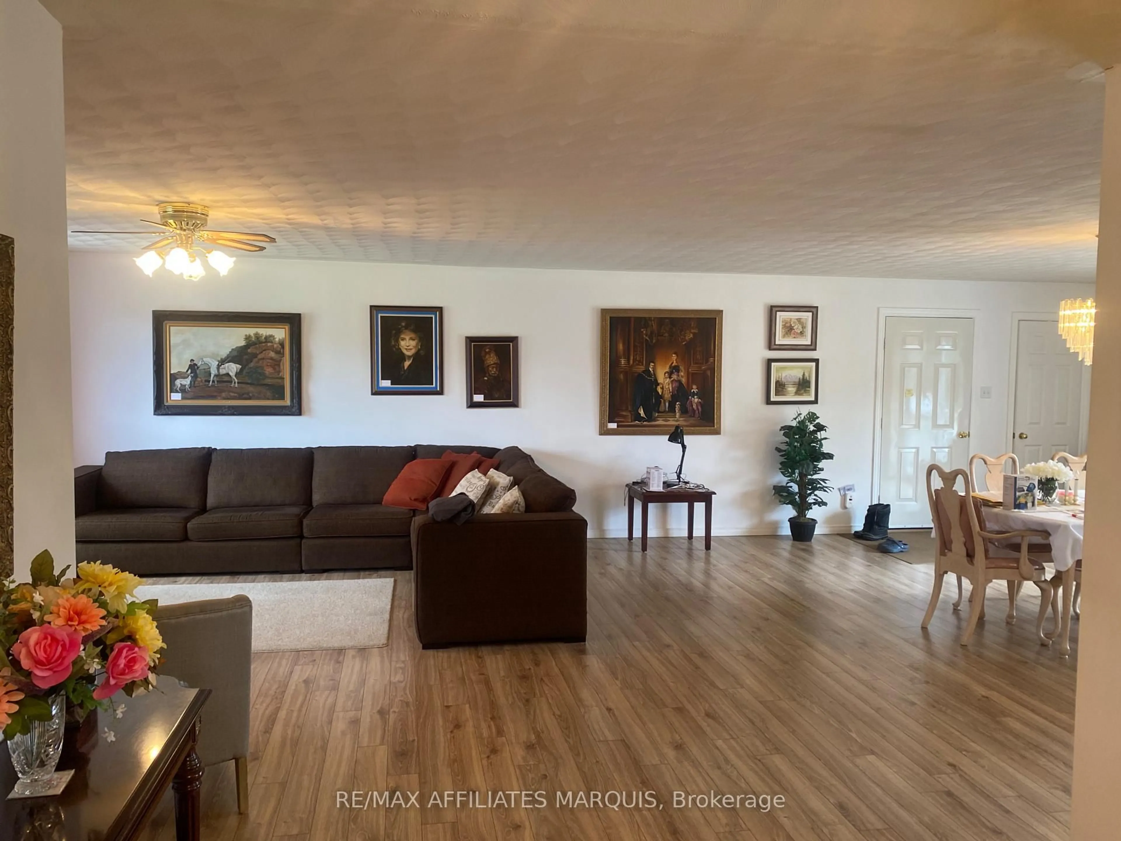 Living room with furniture, wood/laminate floor for 266 Harper Condie Rd Rd, Smiths Falls Ontario K7A 4S6