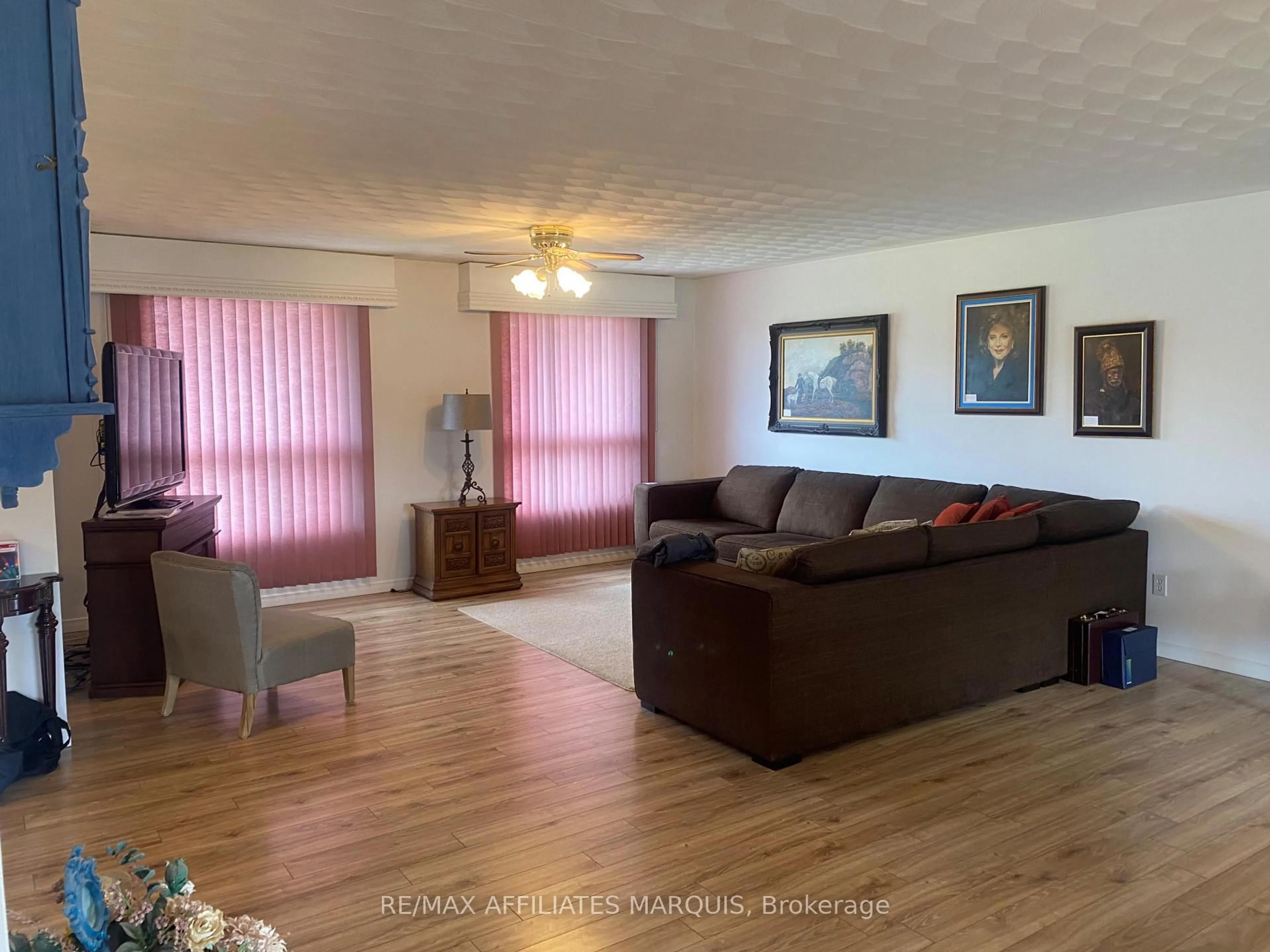 Living room with furniture, wood/laminate floor for 266 Harper Condie Rd Rd, Smiths Falls Ontario K7A 4S6