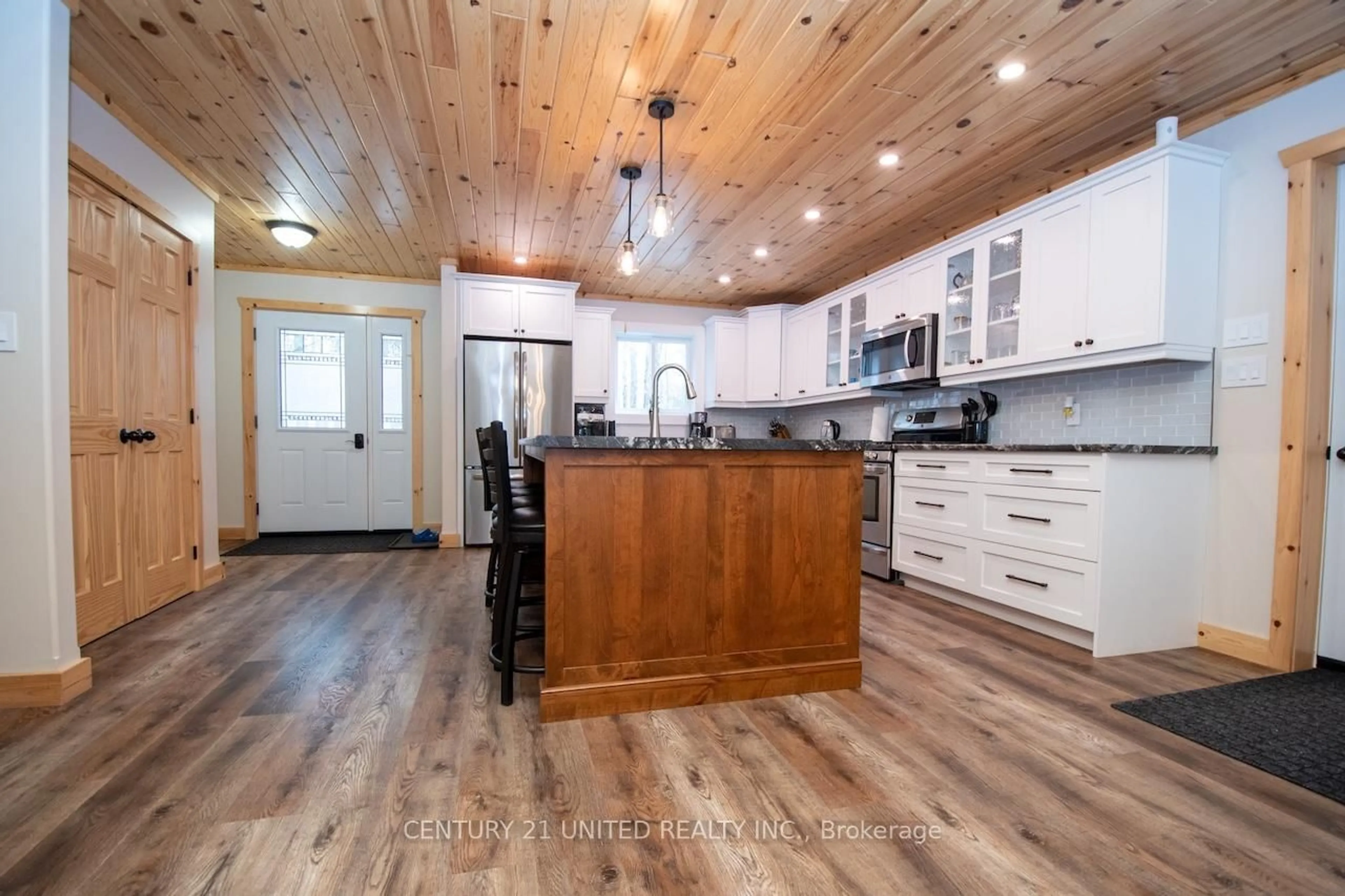 Open concept kitchen, wood/laminate floor for 1525 South Baptiste Lake Rd, Bancroft Ontario K0L 1C0