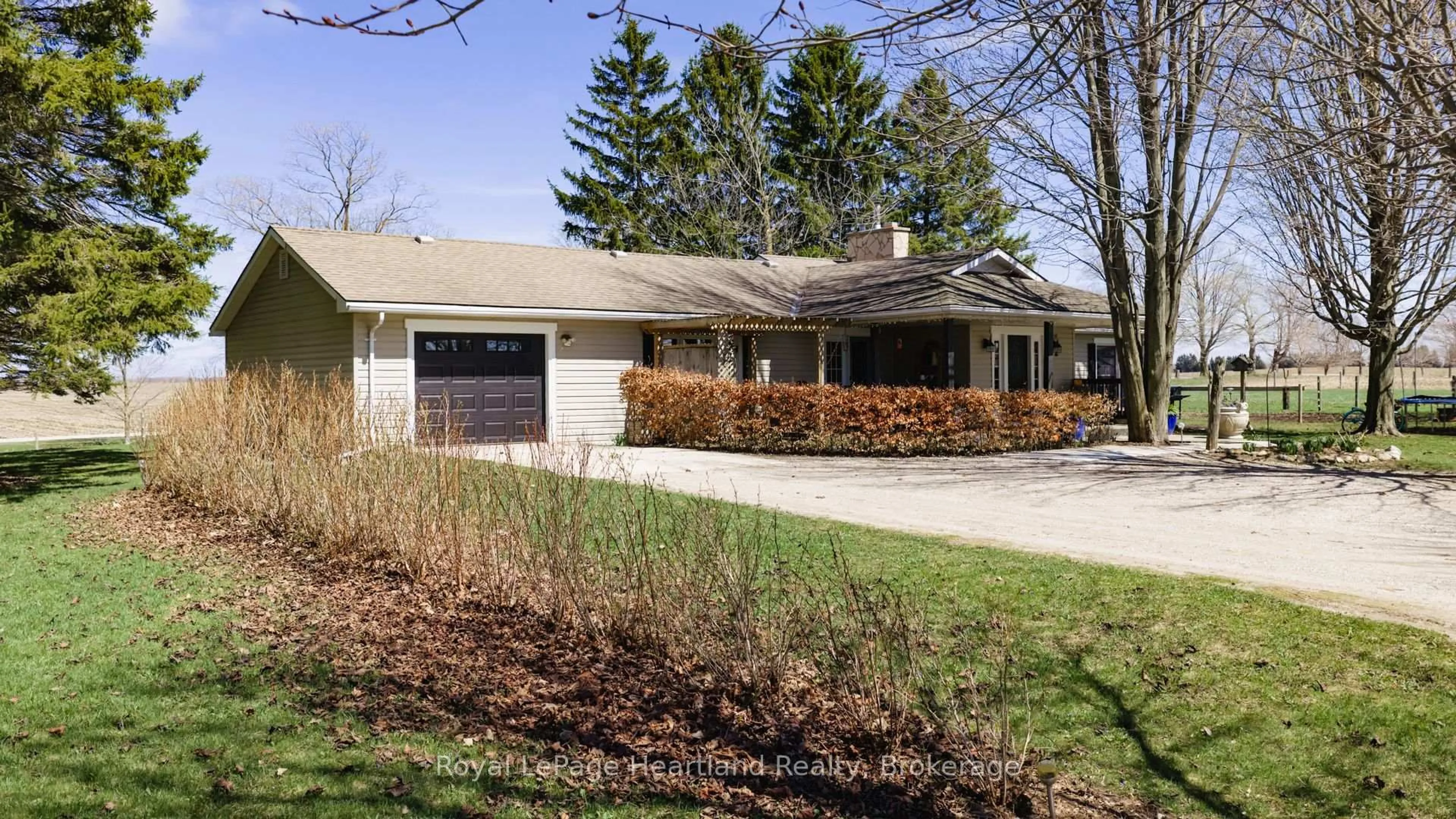 Home with vinyl exterior material, street for 42163 Front Rd, Huron East Ontario N0K 1W0