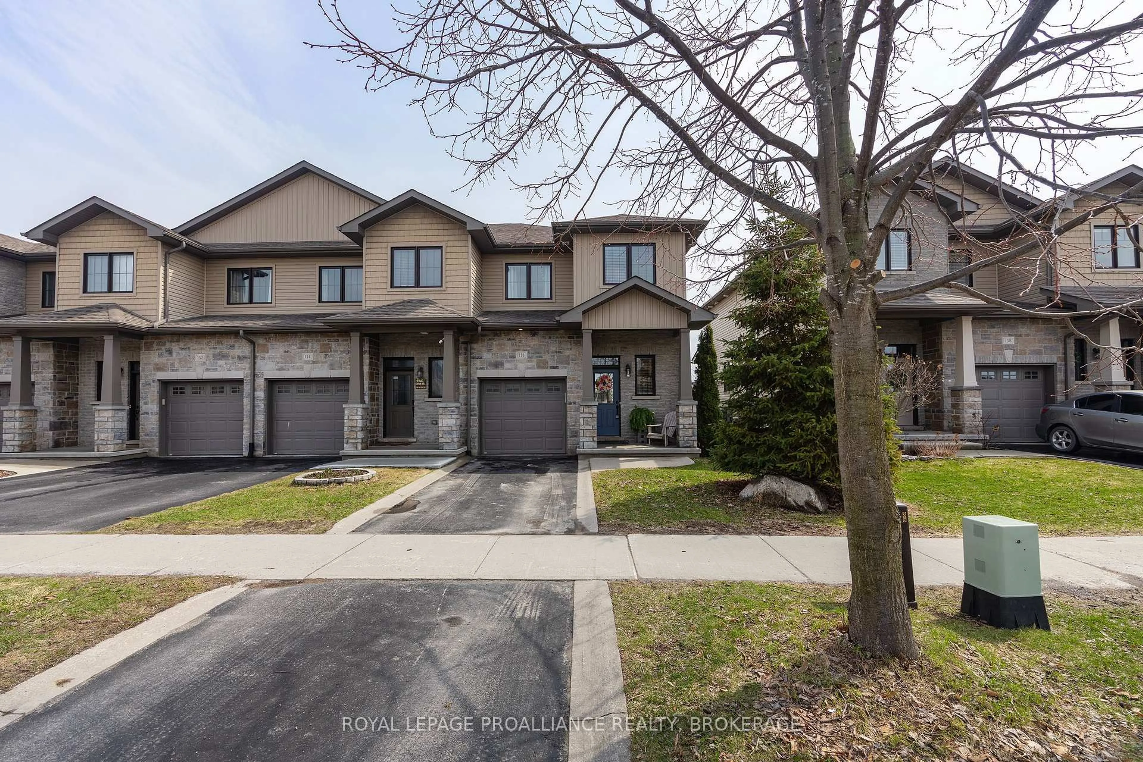 A pic from outside/outdoor area/front of a property/back of a property/a pic from drone, street for 136 Simurda Crt, Loyalist Ontario K7N 0A8