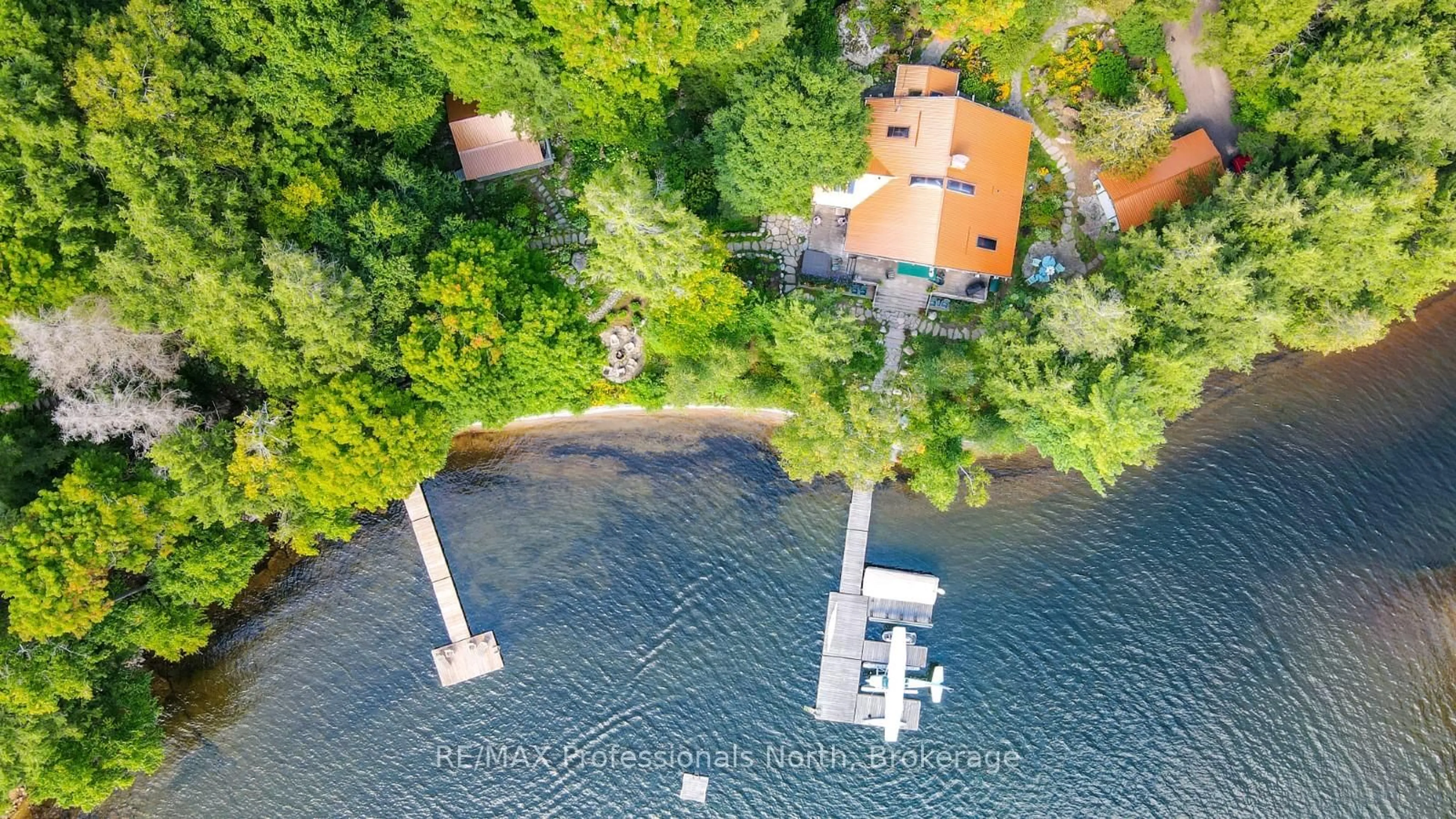 A pic from outside/outdoor area/front of a property/back of a property/a pic from drone, water/lake/river/ocean view for 2718 Wilkinson Rd, Dysart et al Ontario K0M 1S0