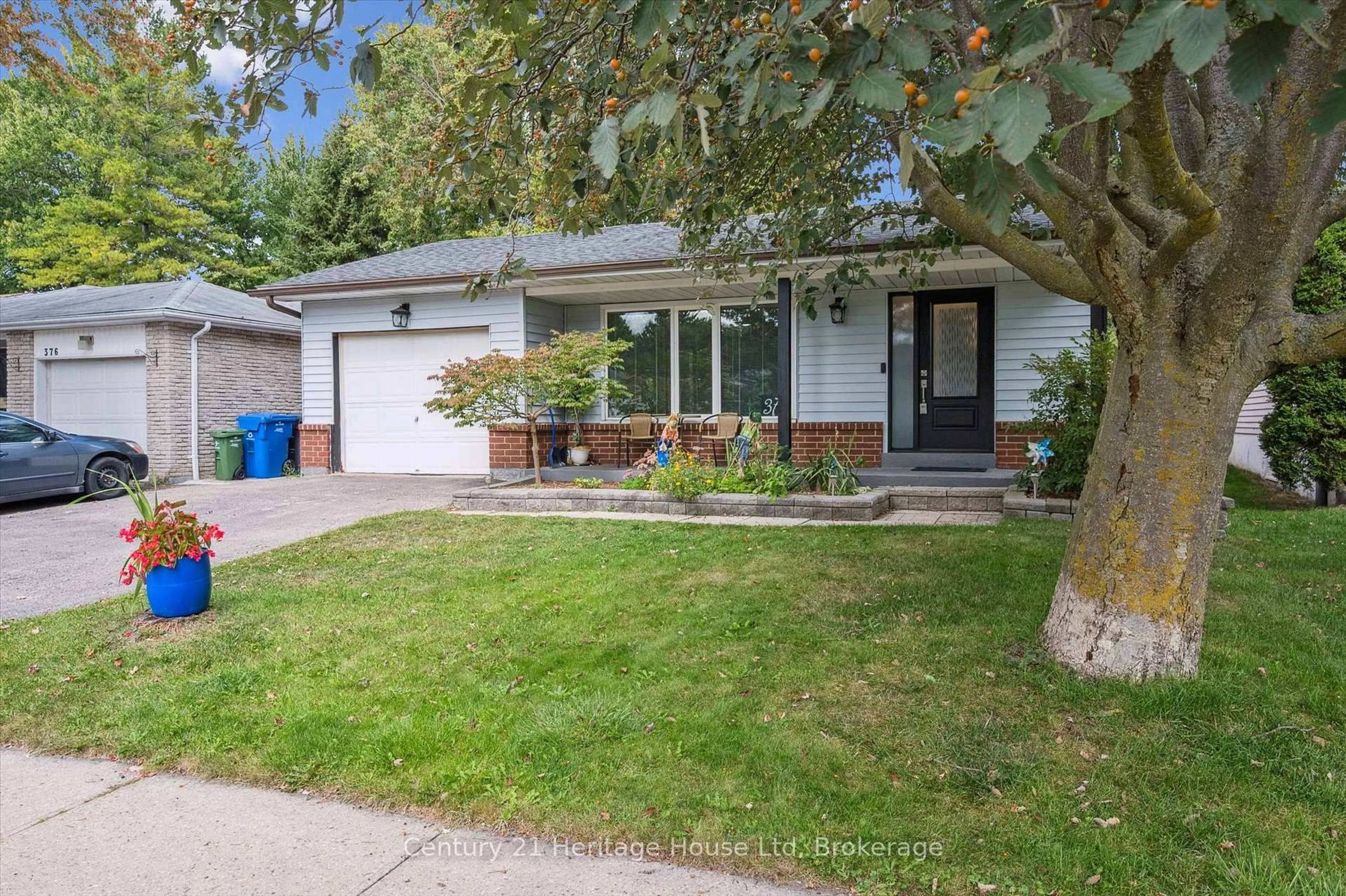 Home with vinyl exterior material, street for 378 West Acres Dr, Guelph Ontario N1H 7A8