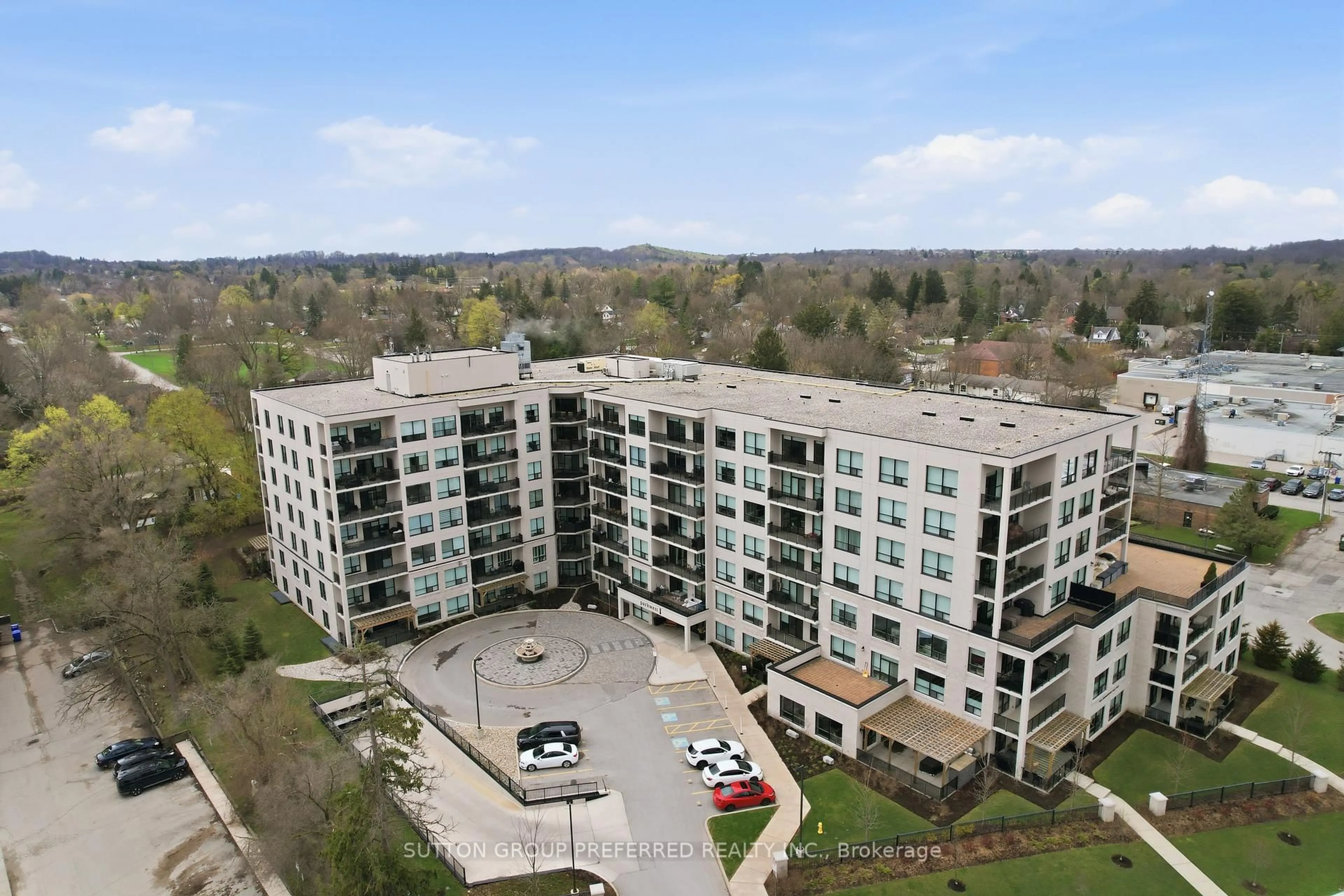 A pic from outside/outdoor area/front of a property/back of a property/a pic from drone, building for 1200 Commissioners Rd #401, London South Ontario N6K 1C7