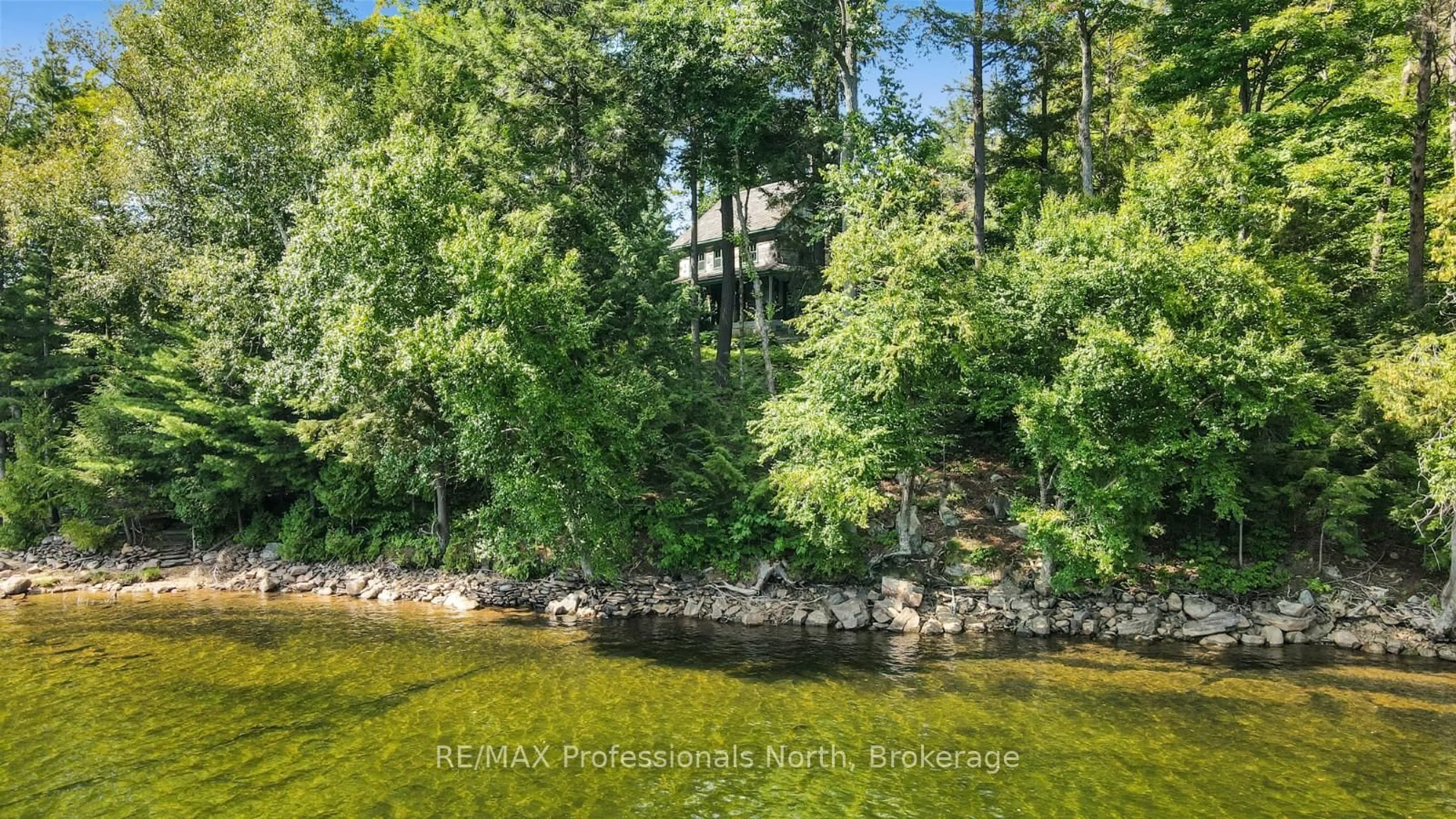 A pic from outside/outdoor area/front of a property/back of a property/a pic from drone, water/lake/river/ocean view for 2682 Wilkinson Rd, Dysart et al Ontario K0M 1S0