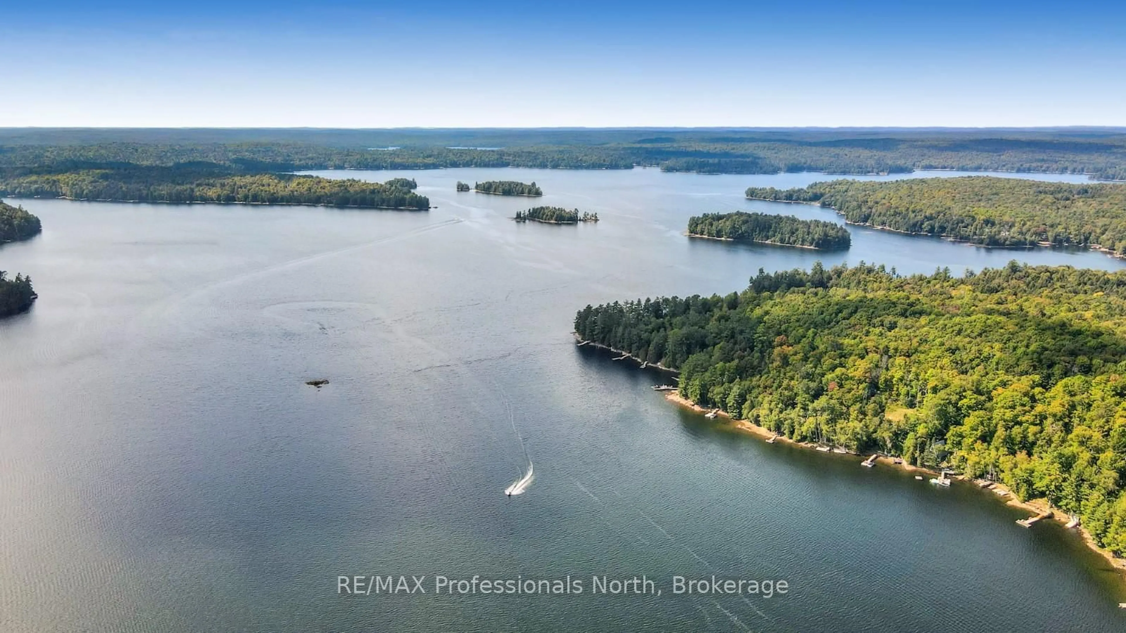 A pic from outside/outdoor area/front of a property/back of a property/a pic from drone, water/lake/river/ocean view for 2682 Wilkinson Rd, Dysart et al Ontario K0M 1S0