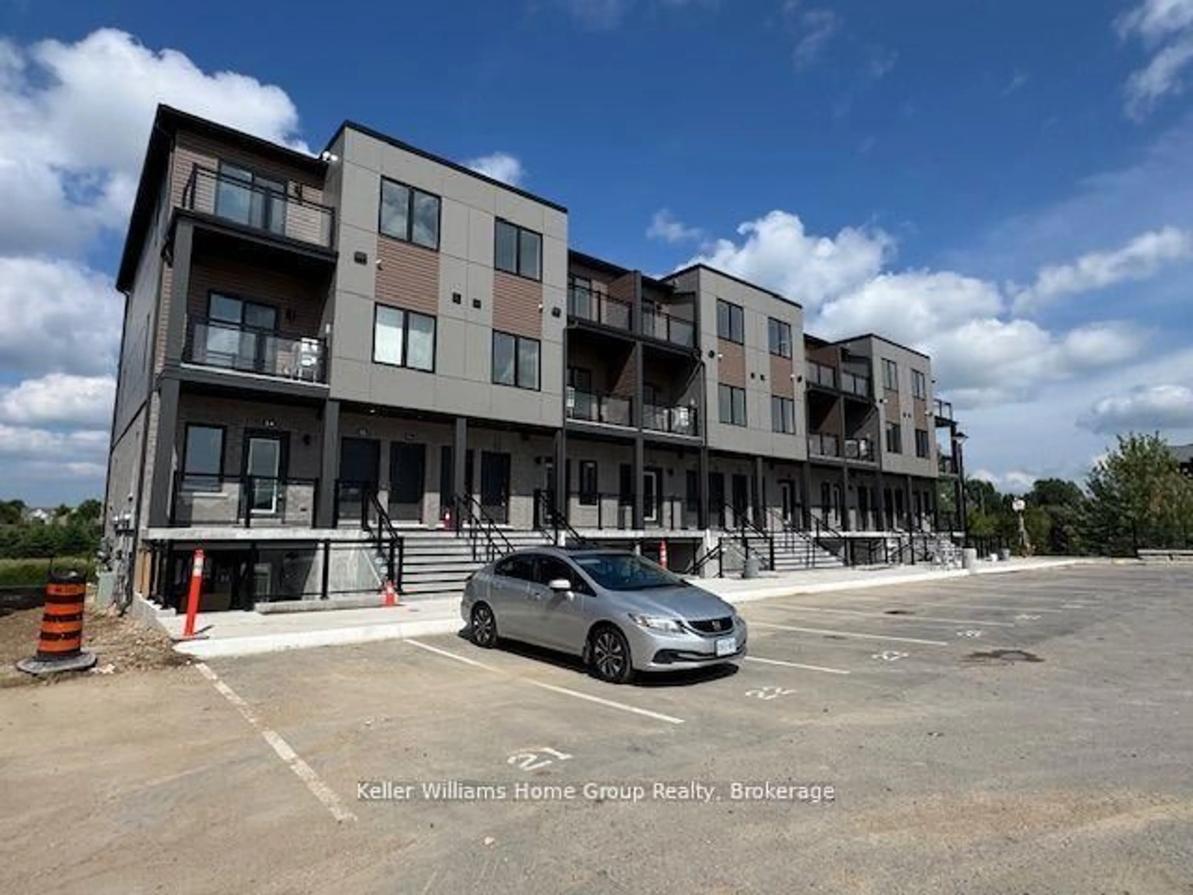 A pic from outside/outdoor area/front of a property/back of a property/a pic from drone, street for 940 St David St #34, Centre Wellington Ontario N1M 2W3