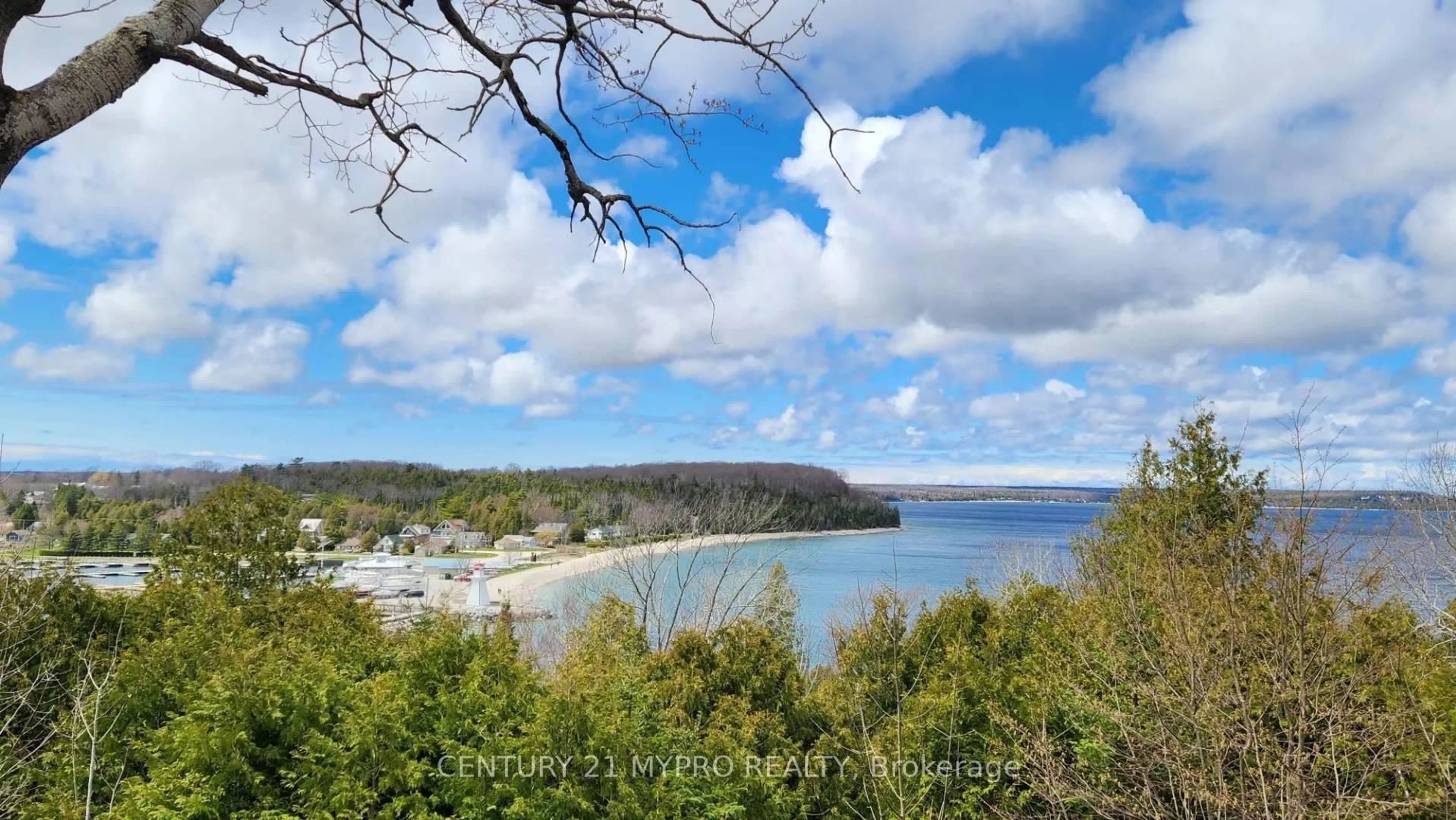 A pic from outside/outdoor area/front of a property/back of a property/a pic from drone, water/lake/river/ocean view for 66 Moore St, Northern Bruce Peninsula Ontario N0H 1W0