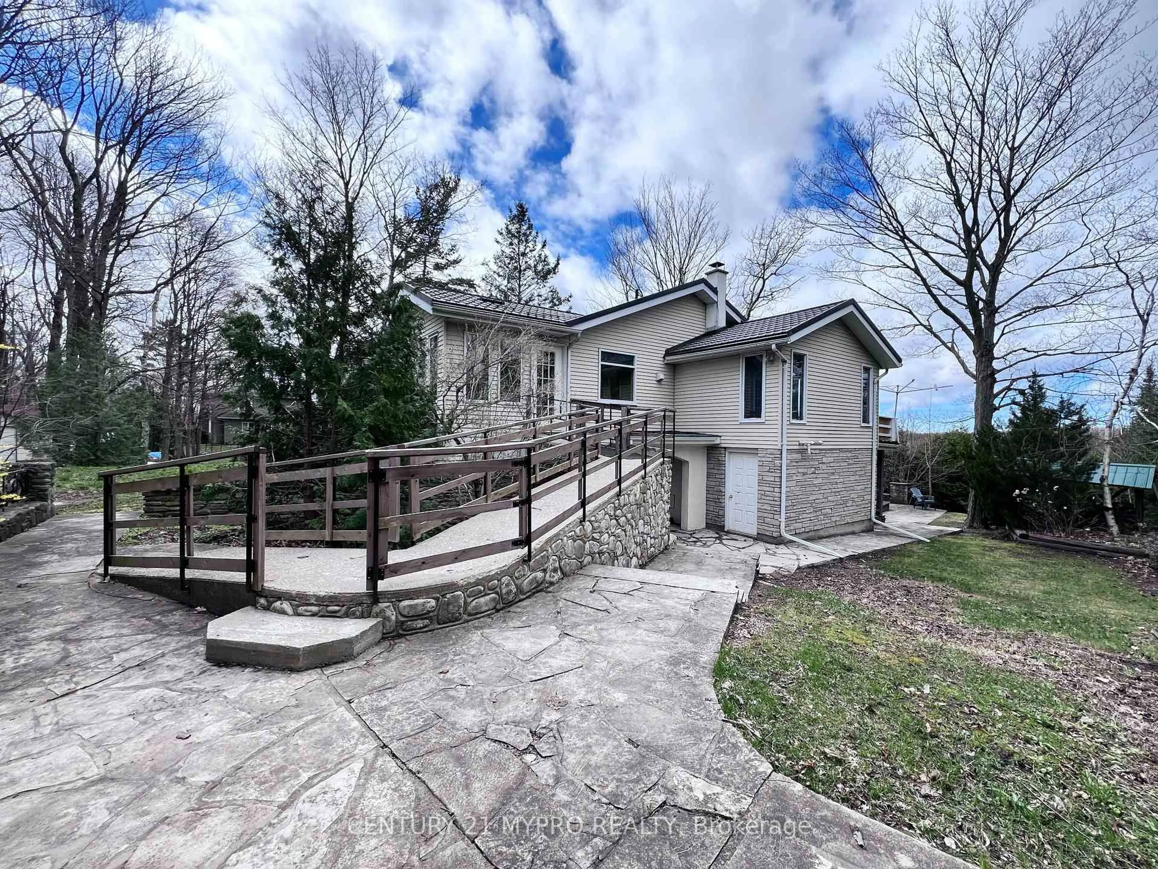 A pic from outside/outdoor area/front of a property/back of a property/a pic from drone, street for 66 Moore St, Northern Bruce Peninsula Ontario N0H 1W0