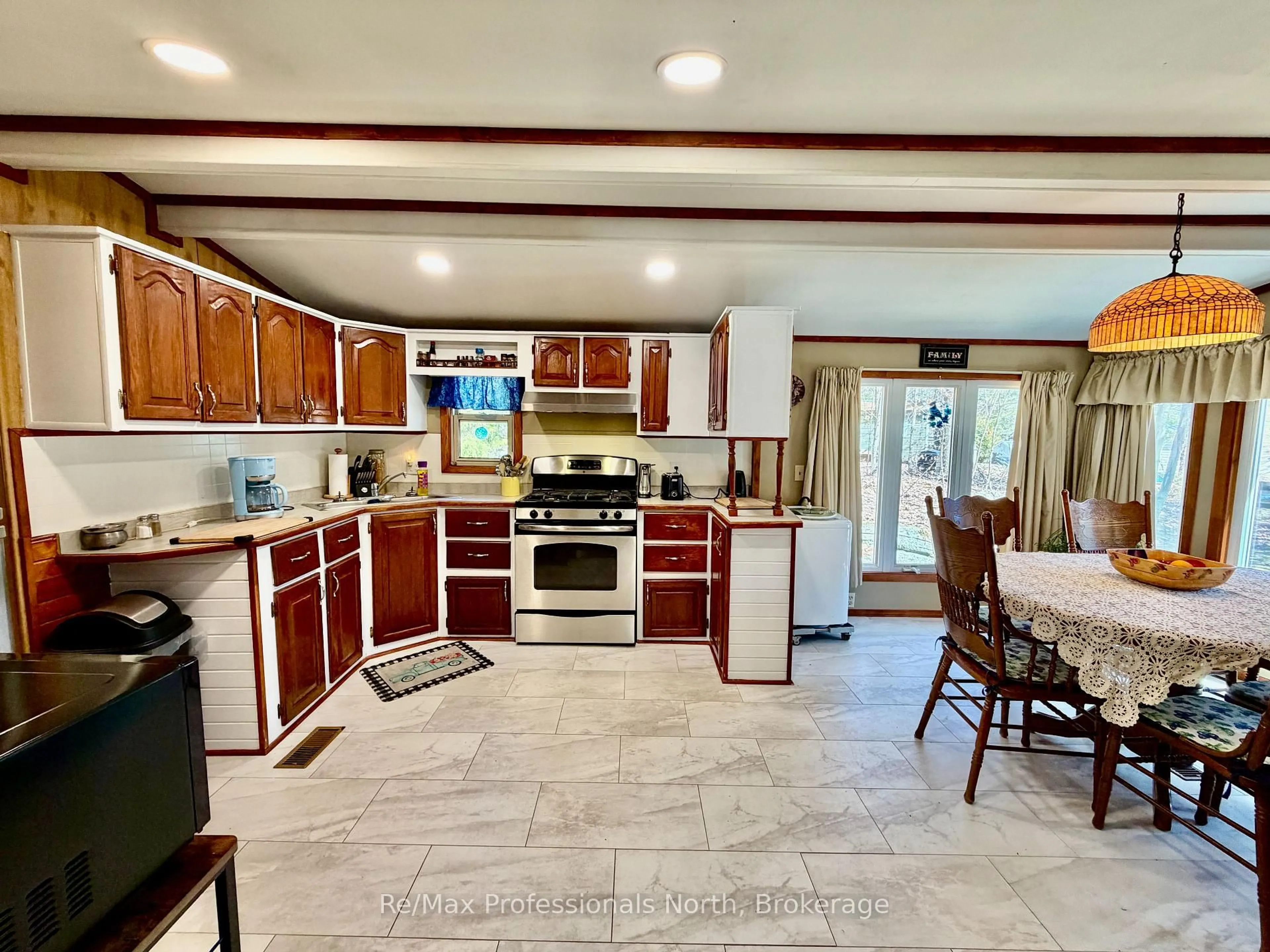 Open concept kitchen, ceramic/tile floor for 1007 Racoon Rd #52, Gravenhurst Ontario P1P 0C3