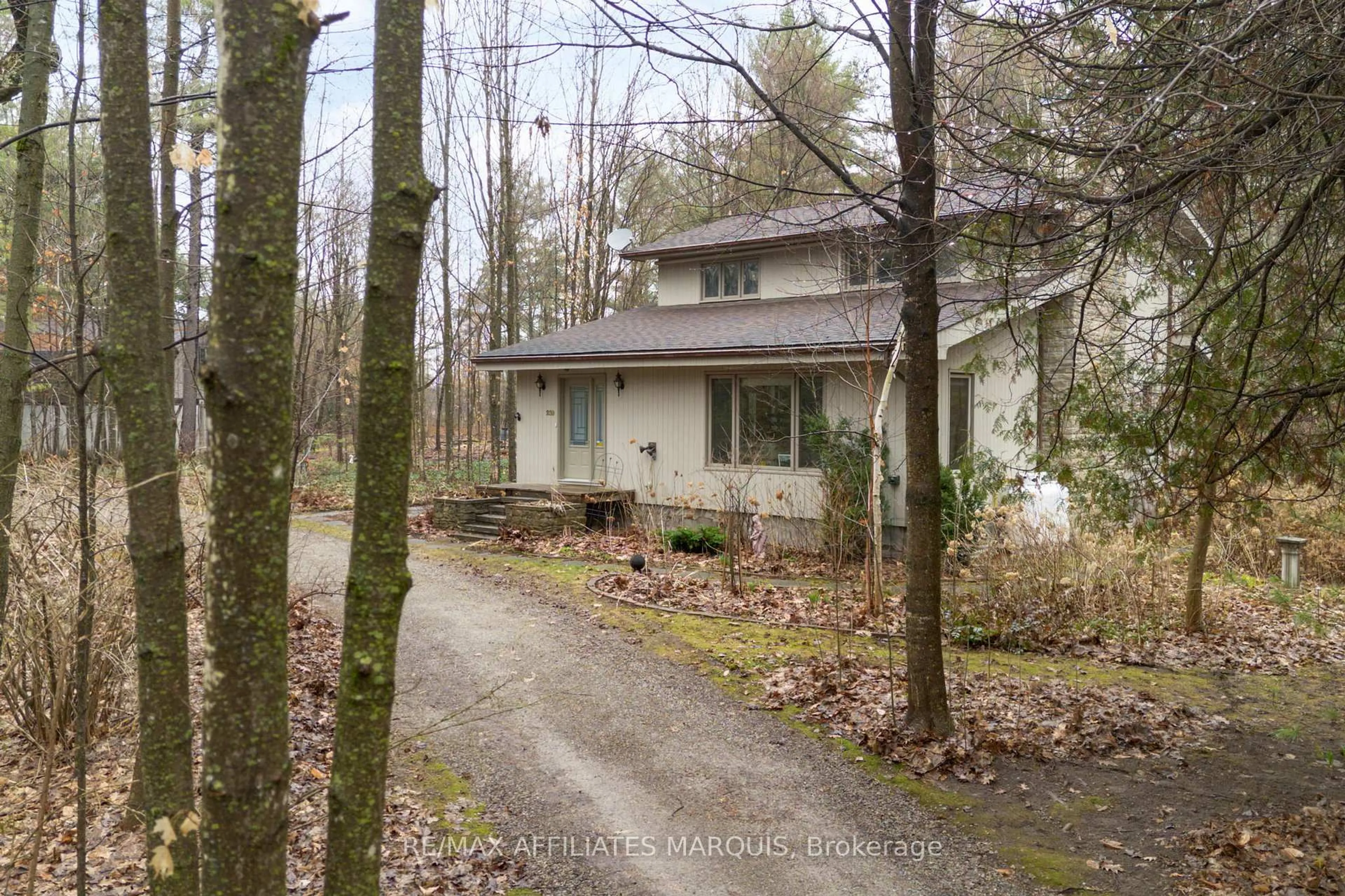 A pic from outside/outdoor area/front of a property/back of a property/a pic from drone, forest/trees view for 239 Bay Rd, Rideau Lakes Ontario K0G 1L0
