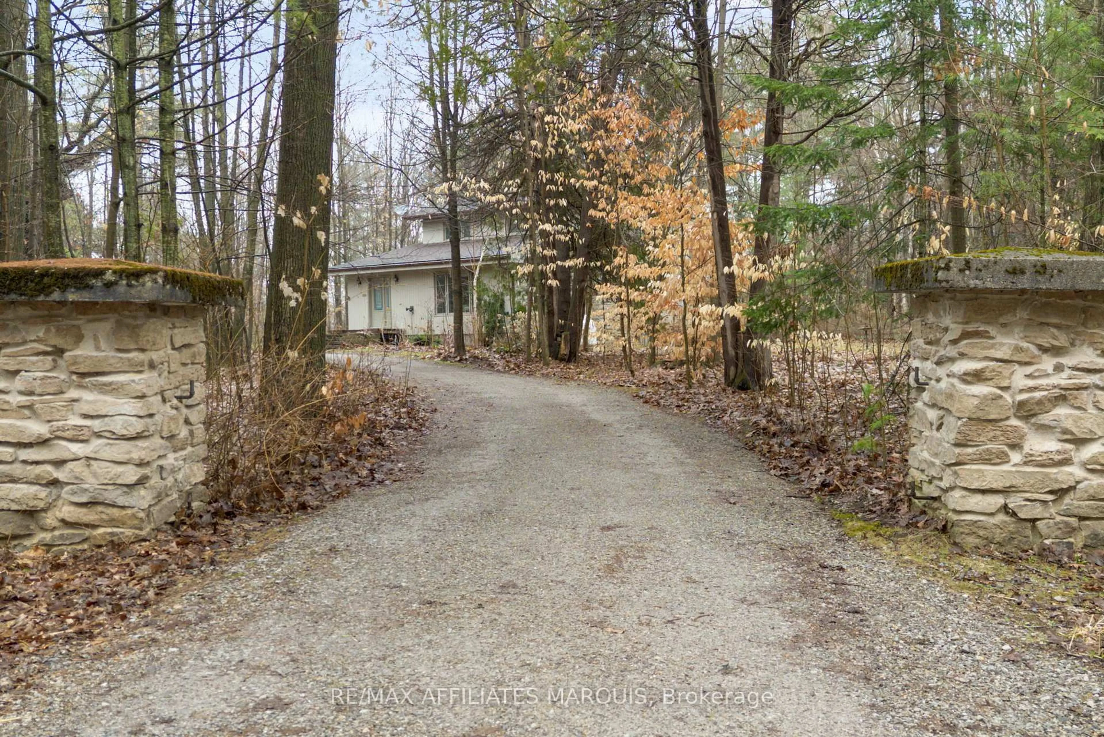 A pic from outside/outdoor area/front of a property/back of a property/a pic from drone, forest/trees view for 239 Bay Rd, Rideau Lakes Ontario K0G 1L0