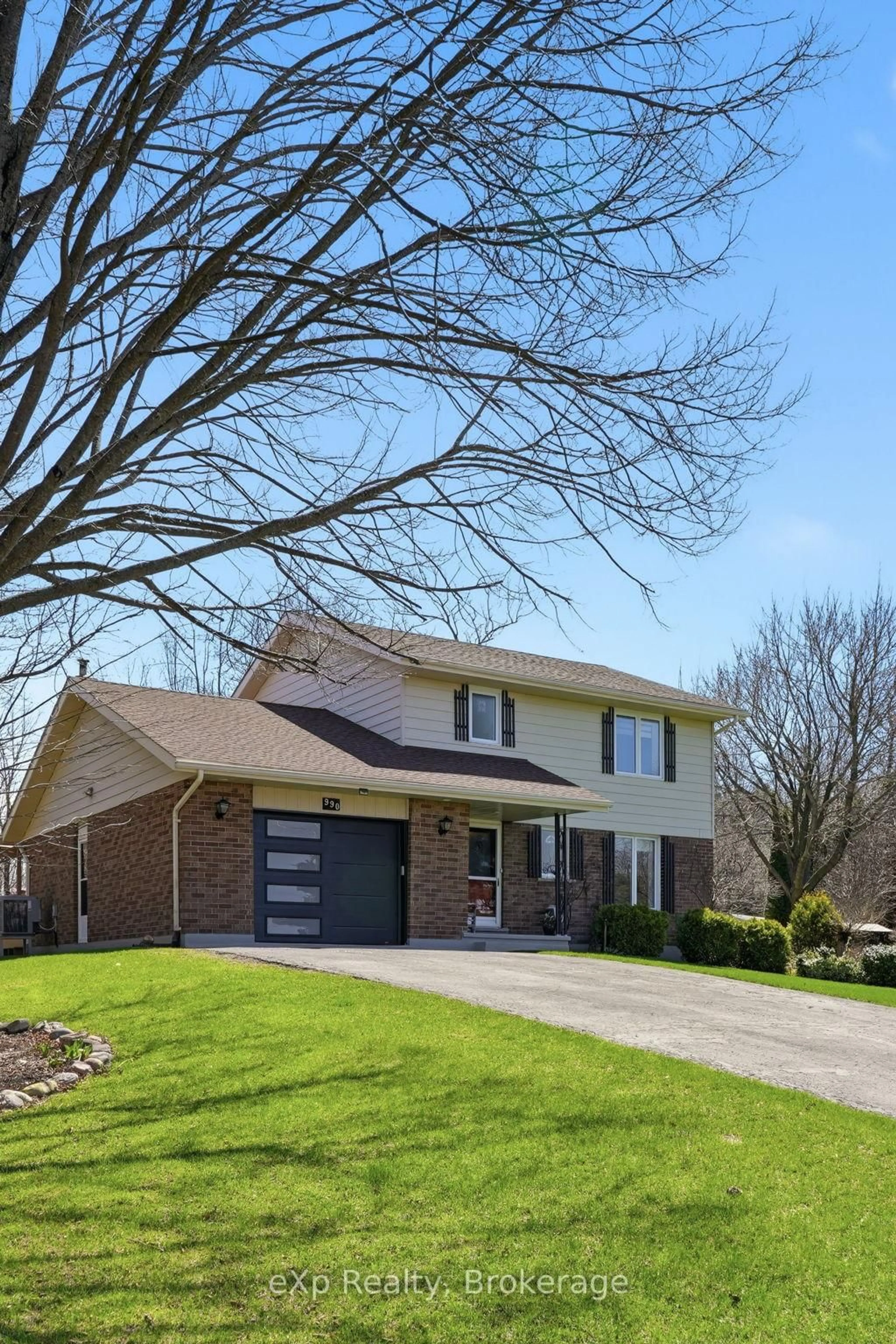 Home with brick exterior material, street for 990 Heritage Dr, Huron-Kinloss Ontario N2Z 0C2
